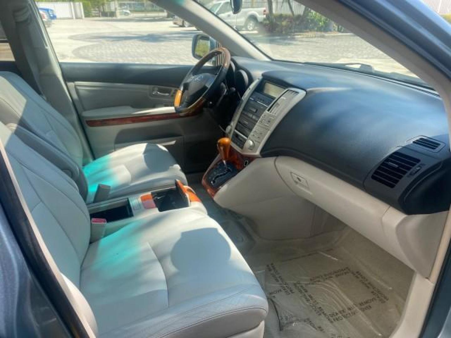 2004 Breakwater Blue Metallic /Light Gray Lexus RX 330 Leather Sunroof CD Cruise Alloy Wheels (2T2GA31U74C) with an 3.3L DOHC MPI 24-Valve V6 Engine engine, Automatic transmission, located at 4701 North Dixie Hwy, Pompano Beach, FL, 33064, (954) 422-2889, 26.240938, -80.123474 - OUR WEBPAGE FLORIDACARS1.COM HAS OVER 100 PHOTOS AND FREE CARFAX LINK 2004 LEXUS RX 330 VIN: 2T2GA31U74C017089 2 T 2 G A 3 1 U 7 4 C 0 1 7 0 8 9 4 DOOR WAGON/SPORT UTILITY 3.3L V6 F 24V GASOLINE FRONT WHEEL DRIVE Highlighted Features Power Sunroof Power Windows Leather Seats 6 Disc CD Changer Alloy - Photo#88