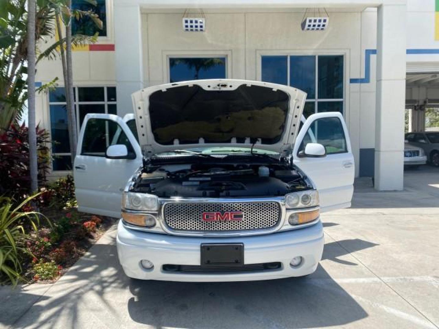 2003 Summit White /Sandstone GMC Yukon Denali 4WD 1 OWNER LOW MILES 65,248 (1GKEK63U03J) with an 6.0L Vortec 6000 V8 SFI Engine engine, Automatic transmission, located at 4701 North Dixie Hwy, Pompano Beach, FL, 33064, (954) 422-2889, 26.240938, -80.123474 - OUR WEBPAGE FLORIDACARS1.COM HAS OVER 100 PHOTOS AND FREE CARFAX LINK 2003 GMC YUKON DENALI 4WD $ 53,090 NEW! VIN: 1GKEK63U03J327650 1 G K E K 6 3 U 0 3 J 3 2 7 6 5 0 4 DOOR WAGON/SPORT UTILITY 6.0L V8 F GASOLINE ALL WHEEL DRIVE Top Features 4WD/AWD Rear Air Conditioning Alloy Wheels Rear Entertainm - Photo#24