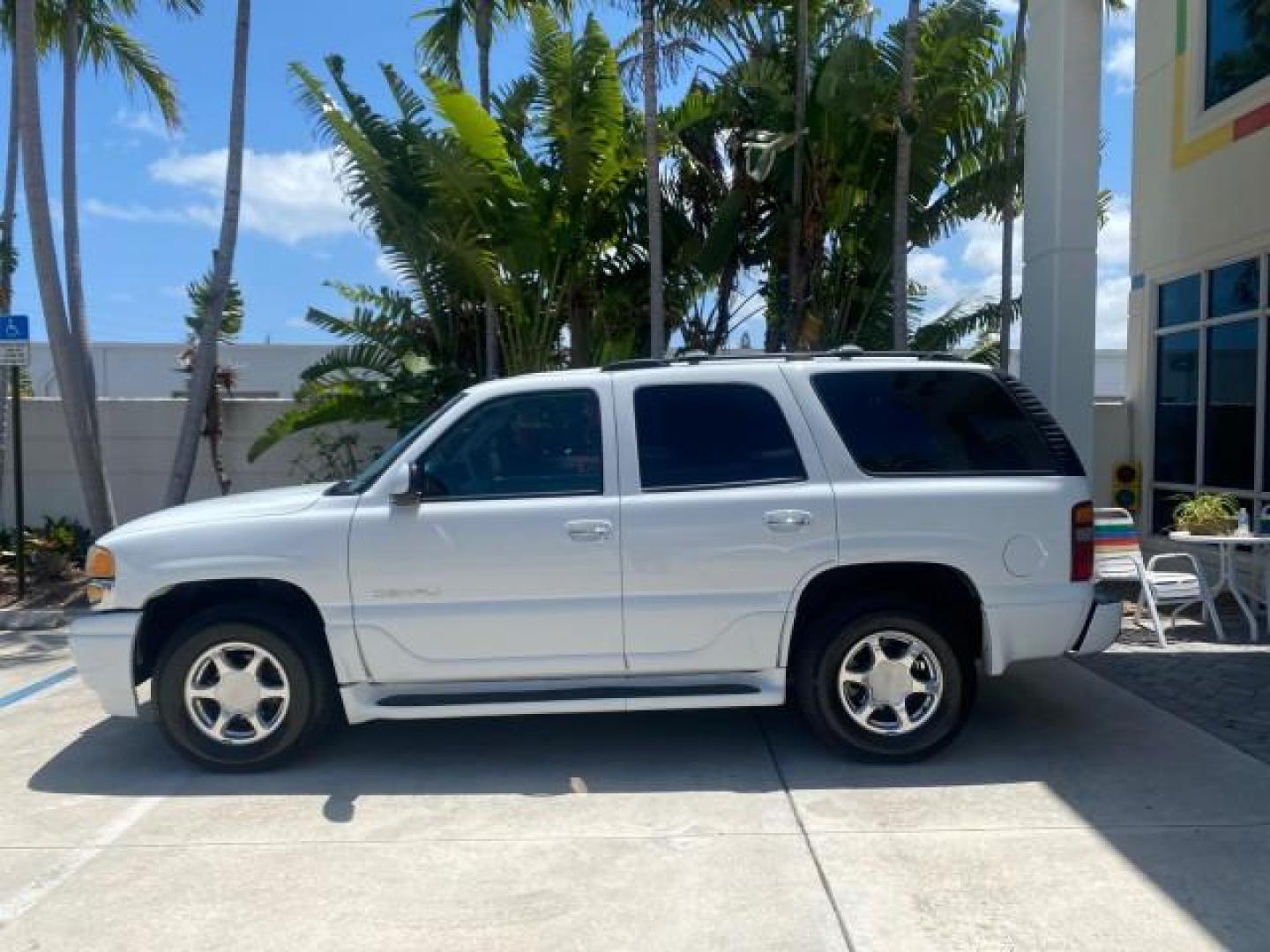 2003 Summit White /Sandstone GMC Yukon Denali 4WD 1 OWNER LOW MILES 65,248 (1GKEK63U03J) with an 6.0L Vortec 6000 V8 SFI Engine engine, Automatic transmission, located at 4701 North Dixie Hwy, Pompano Beach, FL, 33064, (954) 422-2889, 26.240938, -80.123474 - OUR WEBPAGE FLORIDACARS1.COM HAS OVER 100 PHOTOS AND FREE CARFAX LINK 2003 GMC YUKON DENALI 4WD $ 53,090 NEW! VIN: 1GKEK63U03J327650 1 G K E K 6 3 U 0 3 J 3 2 7 6 5 0 4 DOOR WAGON/SPORT UTILITY 6.0L V8 F GASOLINE ALL WHEEL DRIVE Top Features 4WD/AWD Rear Air Conditioning Alloy Wheels Rear Entertainm - Photo#4