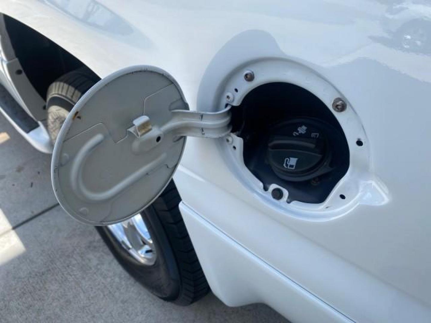 2003 Summit White /Sandstone GMC Yukon Denali 4WD 1 OWNER LOW MILES 65,248 (1GKEK63U03J) with an 6.0L Vortec 6000 V8 SFI Engine engine, Automatic transmission, located at 4701 North Dixie Hwy, Pompano Beach, FL, 33064, (954) 422-2889, 26.240938, -80.123474 - OUR WEBPAGE FLORIDACARS1.COM HAS OVER 100 PHOTOS AND FREE CARFAX LINK 2003 GMC YUKON DENALI 4WD $ 53,090 NEW! VIN: 1GKEK63U03J327650 1 G K E K 6 3 U 0 3 J 3 2 7 6 5 0 4 DOOR WAGON/SPORT UTILITY 6.0L V8 F GASOLINE ALL WHEEL DRIVE Top Features 4WD/AWD Rear Air Conditioning Alloy Wheels Rear Entertainm - Photo#78