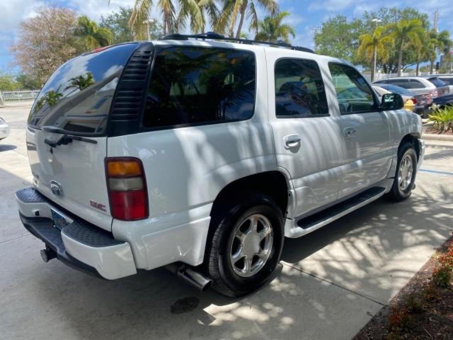 2003 Summit White /Sandstone GMC Yukon Denali 4WD 1 OWNER LOW MILES 65,248 (1GKEK63U03J) with an 6.0L Vortec 6000 V8 SFI Engine engine, Automatic transmission, located at 4701 North Dixie Hwy, Pompano Beach, FL, 33064, (954) 422-2889, 26.240938, -80.123474 - OUR WEBPAGE FLORIDACARS1.COM HAS OVER 100 PHOTOS AND FREE CARFAX LINK 2003 GMC YUKON DENALI 4WD $ 53,090 NEW! VIN: 1GKEK63U03J327650 1 G K E K 6 3 U 0 3 J 3 2 7 6 5 0 4 DOOR WAGON/SPORT UTILITY 6.0L V8 F GASOLINE ALL WHEEL DRIVE Top Features 4WD/AWD Rear Air Conditioning Alloy Wheels Rear Entertainm - Photo#7