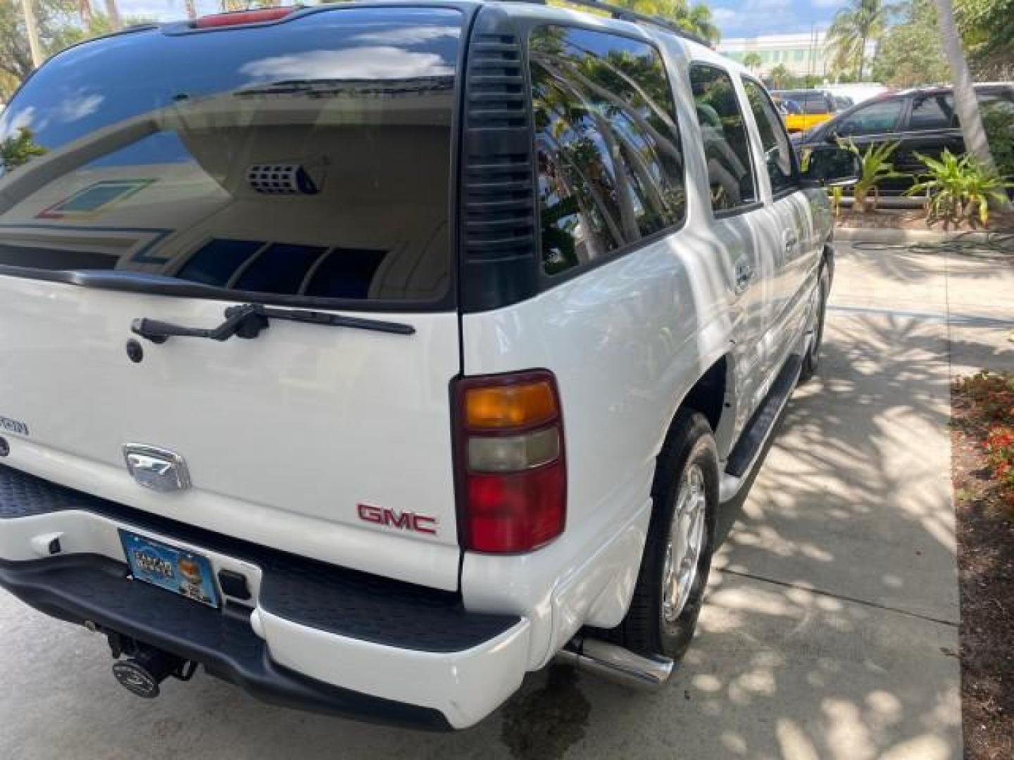 2003 Summit White /Sandstone GMC Yukon Denali 4WD 1 OWNER LOW MILES 65,248 (1GKEK63U03J) with an 6.0L Vortec 6000 V8 SFI Engine engine, Automatic transmission, located at 4701 North Dixie Hwy, Pompano Beach, FL, 33064, (954) 422-2889, 26.240938, -80.123474 - OUR WEBPAGE FLORIDACARS1.COM HAS OVER 100 PHOTOS AND FREE CARFAX LINK 2003 GMC YUKON DENALI 4WD $ 53,090 NEW! VIN: 1GKEK63U03J327650 1 G K E K 6 3 U 0 3 J 3 2 7 6 5 0 4 DOOR WAGON/SPORT UTILITY 6.0L V8 F GASOLINE ALL WHEEL DRIVE Top Features 4WD/AWD Rear Air Conditioning Alloy Wheels Rear Entertainm - Photo#81