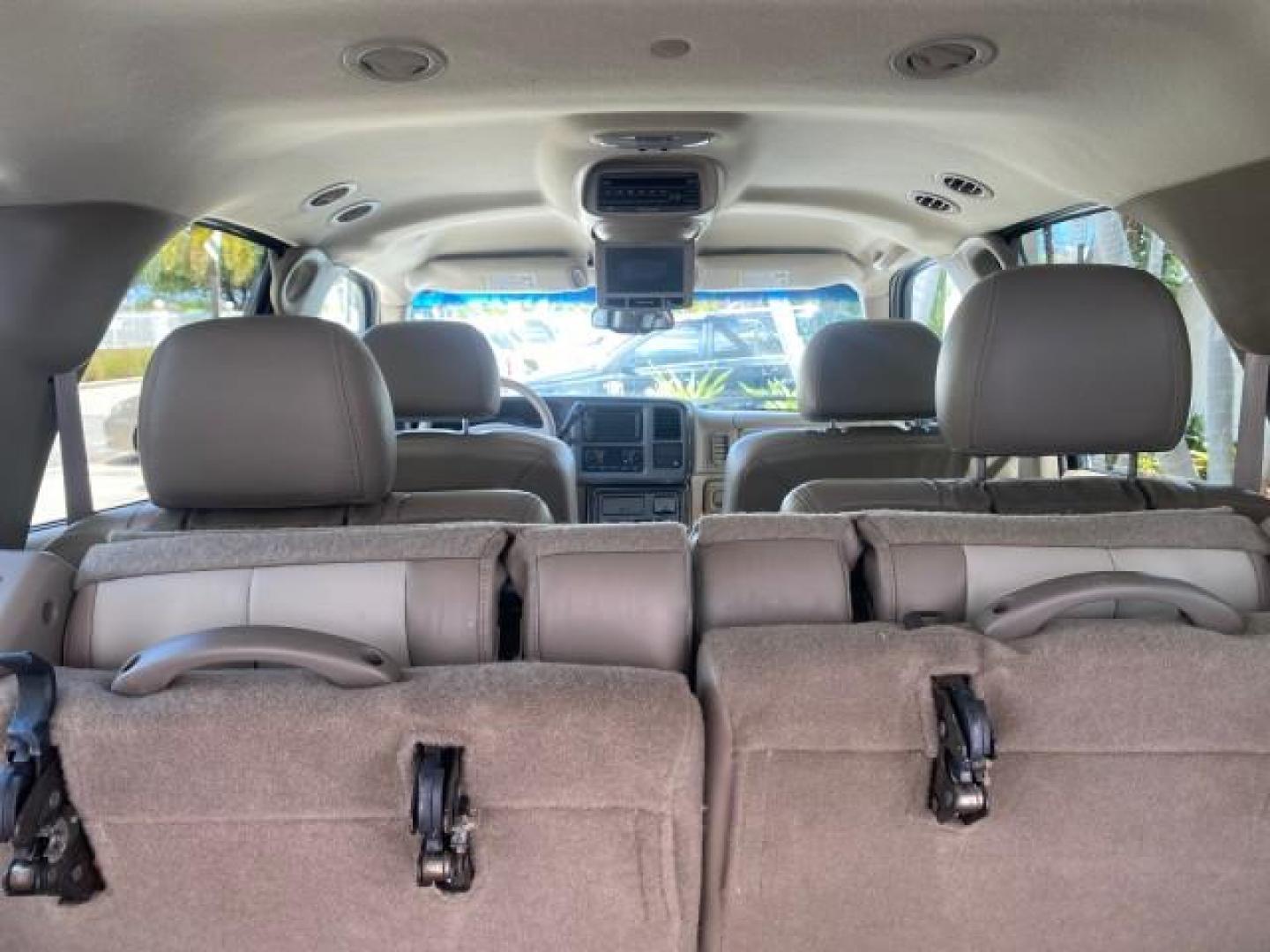 2003 Summit White /Sandstone GMC Yukon Denali 4WD 1 OWNER LOW MILES 65,248 (1GKEK63U03J) with an 6.0L Vortec 6000 V8 SFI Engine engine, Automatic transmission, located at 4701 North Dixie Hwy, Pompano Beach, FL, 33064, (954) 422-2889, 26.240938, -80.123474 - OUR WEBPAGE FLORIDACARS1.COM HAS OVER 100 PHOTOS AND FREE CARFAX LINK 2003 GMC YUKON DENALI 4WD $ 53,090 NEW! VIN: 1GKEK63U03J327650 1 G K E K 6 3 U 0 3 J 3 2 7 6 5 0 4 DOOR WAGON/SPORT UTILITY 6.0L V8 F GASOLINE ALL WHEEL DRIVE Top Features 4WD/AWD Rear Air Conditioning Alloy Wheels Rear Entertainm - Photo#84
