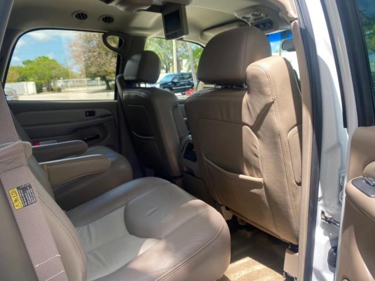 2003 Summit White /Sandstone GMC Yukon Denali 4WD 1 OWNER LOW MILES 65,248 (1GKEK63U03J) with an 6.0L Vortec 6000 V8 SFI Engine engine, Automatic transmission, located at 4701 North Dixie Hwy, Pompano Beach, FL, 33064, (954) 422-2889, 26.240938, -80.123474 - OUR WEBPAGE FLORIDACARS1.COM HAS OVER 100 PHOTOS AND FREE CARFAX LINK 2003 GMC YUKON DENALI 4WD $ 53,090 NEW! VIN: 1GKEK63U03J327650 1 G K E K 6 3 U 0 3 J 3 2 7 6 5 0 4 DOOR WAGON/SPORT UTILITY 6.0L V8 F GASOLINE ALL WHEEL DRIVE Top Features 4WD/AWD Rear Air Conditioning Alloy Wheels Rear Entertainm - Photo#92