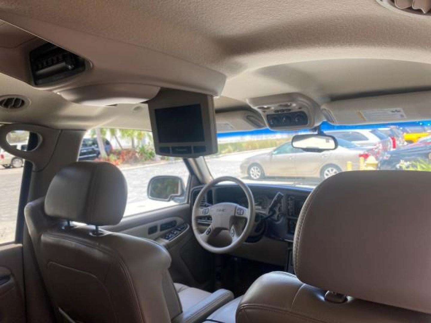 2003 Summit White /Sandstone GMC Yukon Denali 4WD 1 OWNER LOW MILES 65,248 (1GKEK63U03J) with an 6.0L Vortec 6000 V8 SFI Engine engine, Automatic transmission, located at 4701 North Dixie Hwy, Pompano Beach, FL, 33064, (954) 422-2889, 26.240938, -80.123474 - OUR WEBPAGE FLORIDACARS1.COM HAS OVER 100 PHOTOS AND FREE CARFAX LINK 2003 GMC YUKON DENALI 4WD $ 53,090 NEW! VIN: 1GKEK63U03J327650 1 G K E K 6 3 U 0 3 J 3 2 7 6 5 0 4 DOOR WAGON/SPORT UTILITY 6.0L V8 F GASOLINE ALL WHEEL DRIVE Top Features 4WD/AWD Rear Air Conditioning Alloy Wheels Rear Entertainm - Photo#95