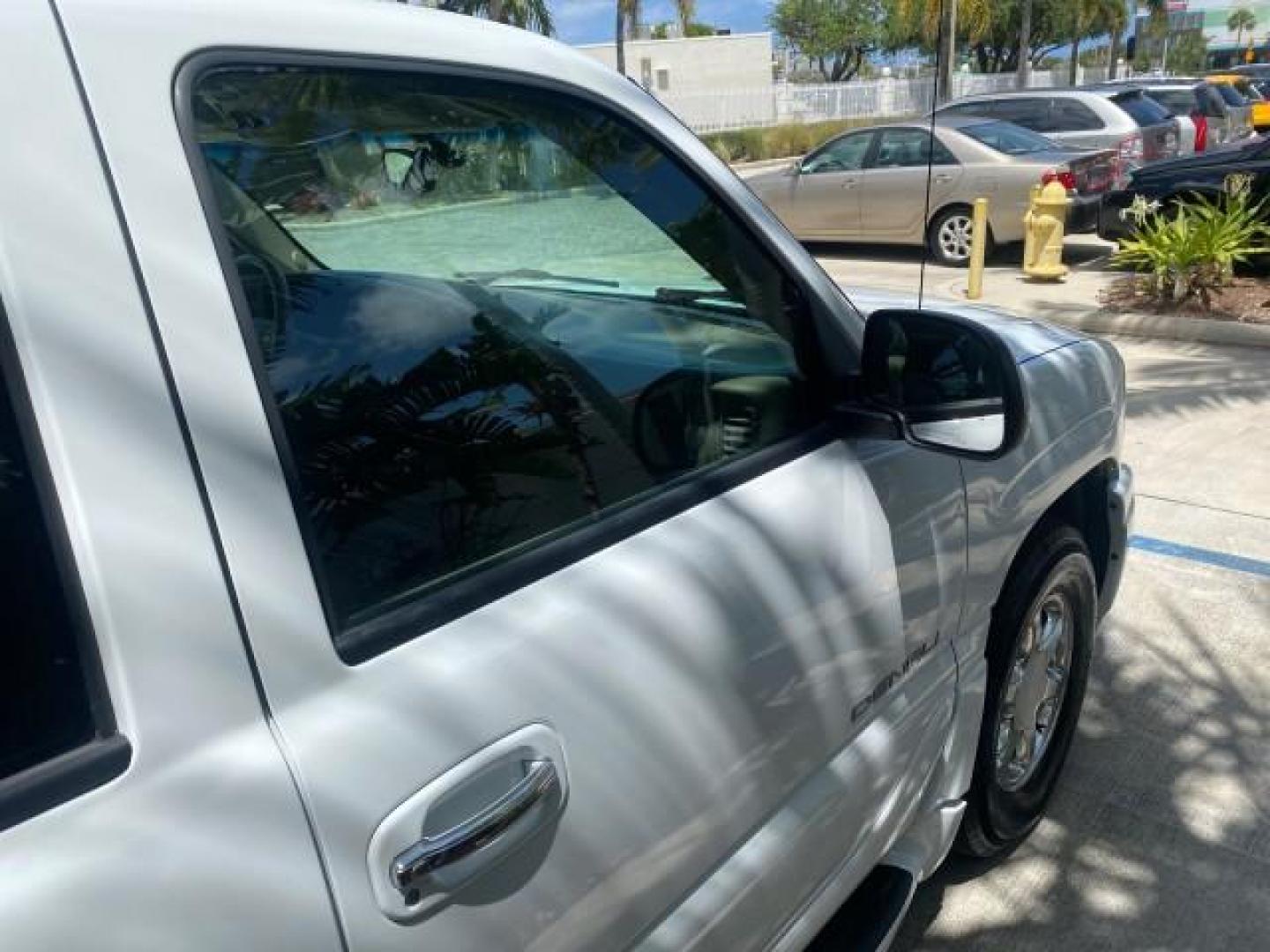 2003 Summit White /Sandstone GMC Yukon Denali 4WD 1 OWNER LOW MILES 65,248 (1GKEK63U03J) with an 6.0L Vortec 6000 V8 SFI Engine engine, Automatic transmission, located at 4701 North Dixie Hwy, Pompano Beach, FL, 33064, (954) 422-2889, 26.240938, -80.123474 - OUR WEBPAGE FLORIDACARS1.COM HAS OVER 100 PHOTOS AND FREE CARFAX LINK 2003 GMC YUKON DENALI 4WD $ 53,090 NEW! VIN: 1GKEK63U03J327650 1 G K E K 6 3 U 0 3 J 3 2 7 6 5 0 4 DOOR WAGON/SPORT UTILITY 6.0L V8 F GASOLINE ALL WHEEL DRIVE Top Features 4WD/AWD Rear Air Conditioning Alloy Wheels Rear Entertainm - Photo#96