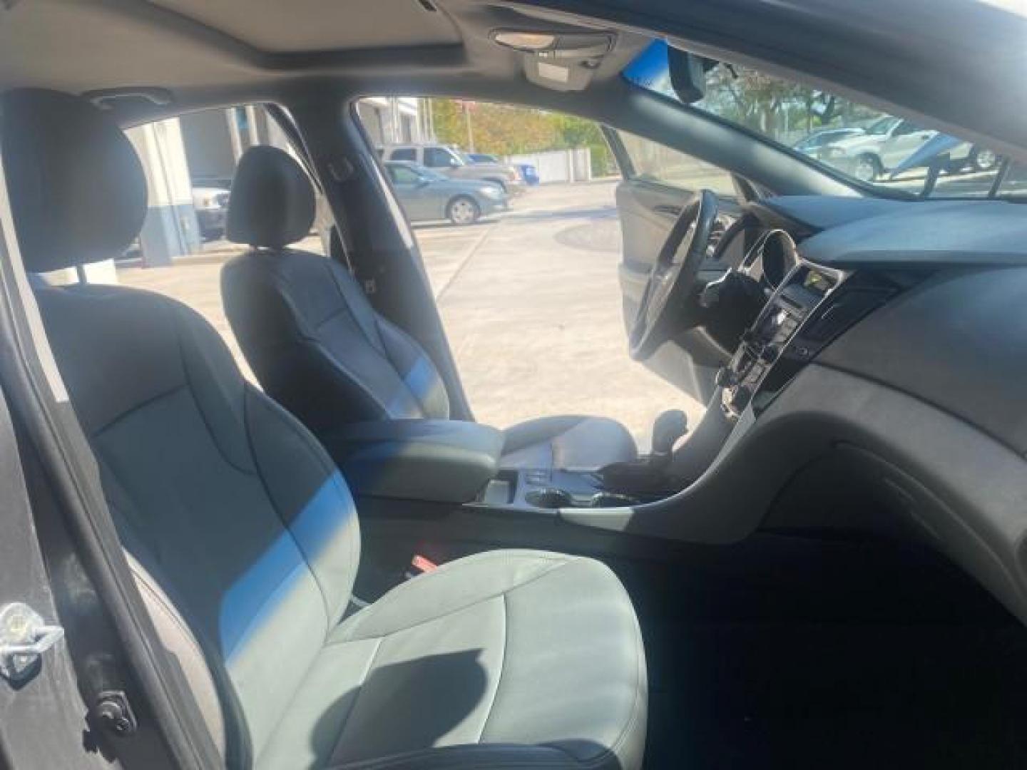 2013 Harbor Gray Metallic /Gray Hyundai Sonata Limited 29 SERVICES FL (5NPEC4AB5DH) with an 2.0L DOHC 16-Valve I4 Turbocharged GDI Engine engine, Automatic transmission, located at 4701 North Dixie Hwy, Pompano Beach, FL, 33064, (954) 422-2889, 26.240938, -80.123474 - OUR WEBPAGE FLORIDACARS1.COM HAS OVER 100 PHOTOS AND FREE CARFAX LINK 2013 HYUNDAI SONATA SE 2.0T VIN: 5NPEC4AB5DH558214 5 N P E C 4 A B 5 D H 5 5 8 2 1 4 SEDAN 4 DR 2.0L I4 F DOHC 16V GASOLINE FRONT WHEEL DRIVE Highlighted Features Sunroof CD Player Leather Seats Alloy Wheels Power Windows Power Lo - Photo#12