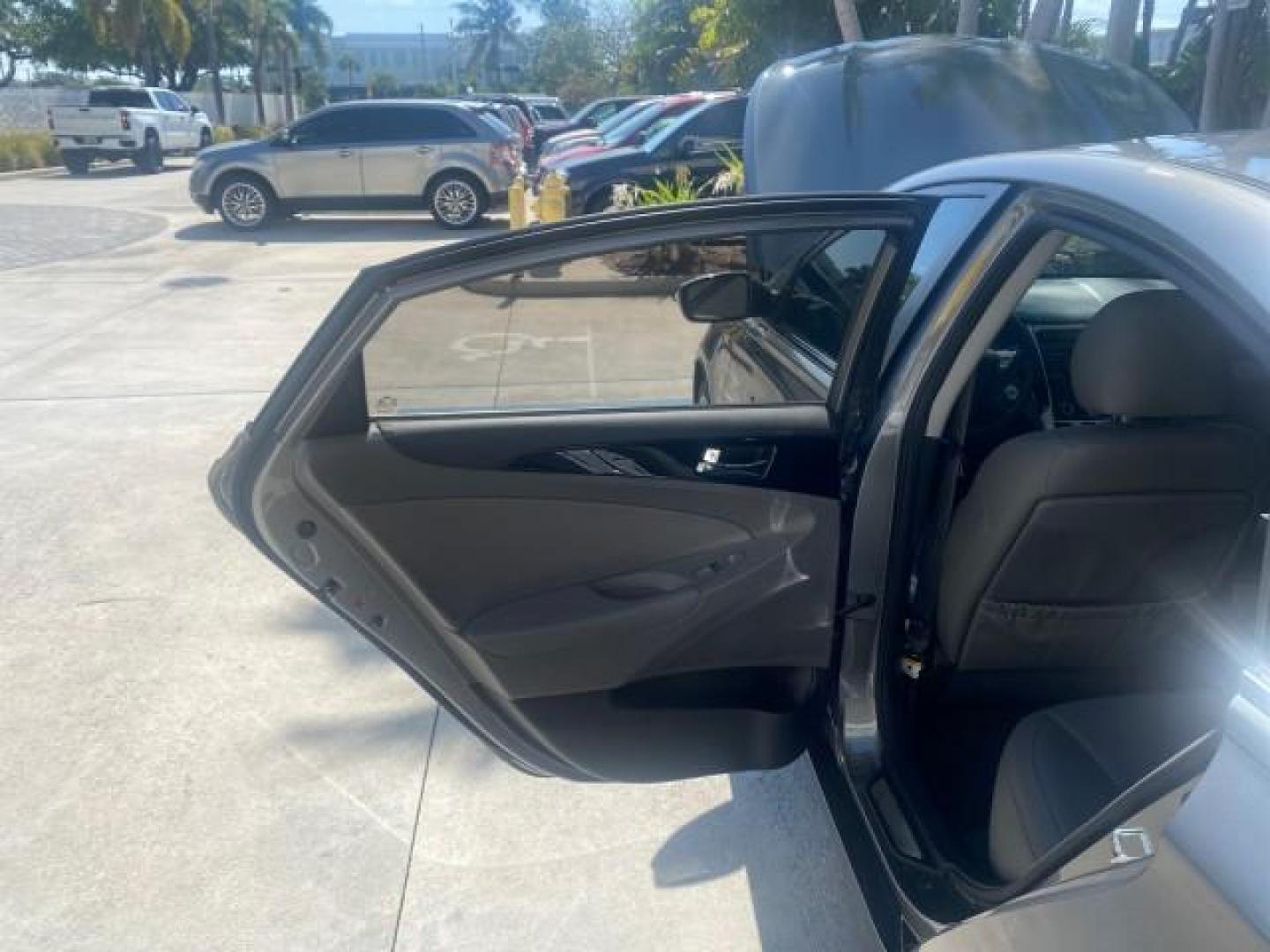 2013 Harbor Gray Metallic /Gray Hyundai Sonata Limited 29 SERVICES FL (5NPEC4AB5DH) with an 2.0L DOHC 16-Valve I4 Turbocharged GDI Engine engine, Automatic transmission, located at 4701 North Dixie Hwy, Pompano Beach, FL, 33064, (954) 422-2889, 26.240938, -80.123474 - OUR WEBPAGE FLORIDACARS1.COM HAS OVER 100 PHOTOS AND FREE CARFAX LINK 2013 HYUNDAI SONATA SE 2.0T VIN: 5NPEC4AB5DH558214 5 N P E C 4 A B 5 D H 5 5 8 2 1 4 SEDAN 4 DR 2.0L I4 F DOHC 16V GASOLINE FRONT WHEEL DRIVE Highlighted Features Sunroof CD Player Leather Seats Alloy Wheels Power Windows Power Lo - Photo#13