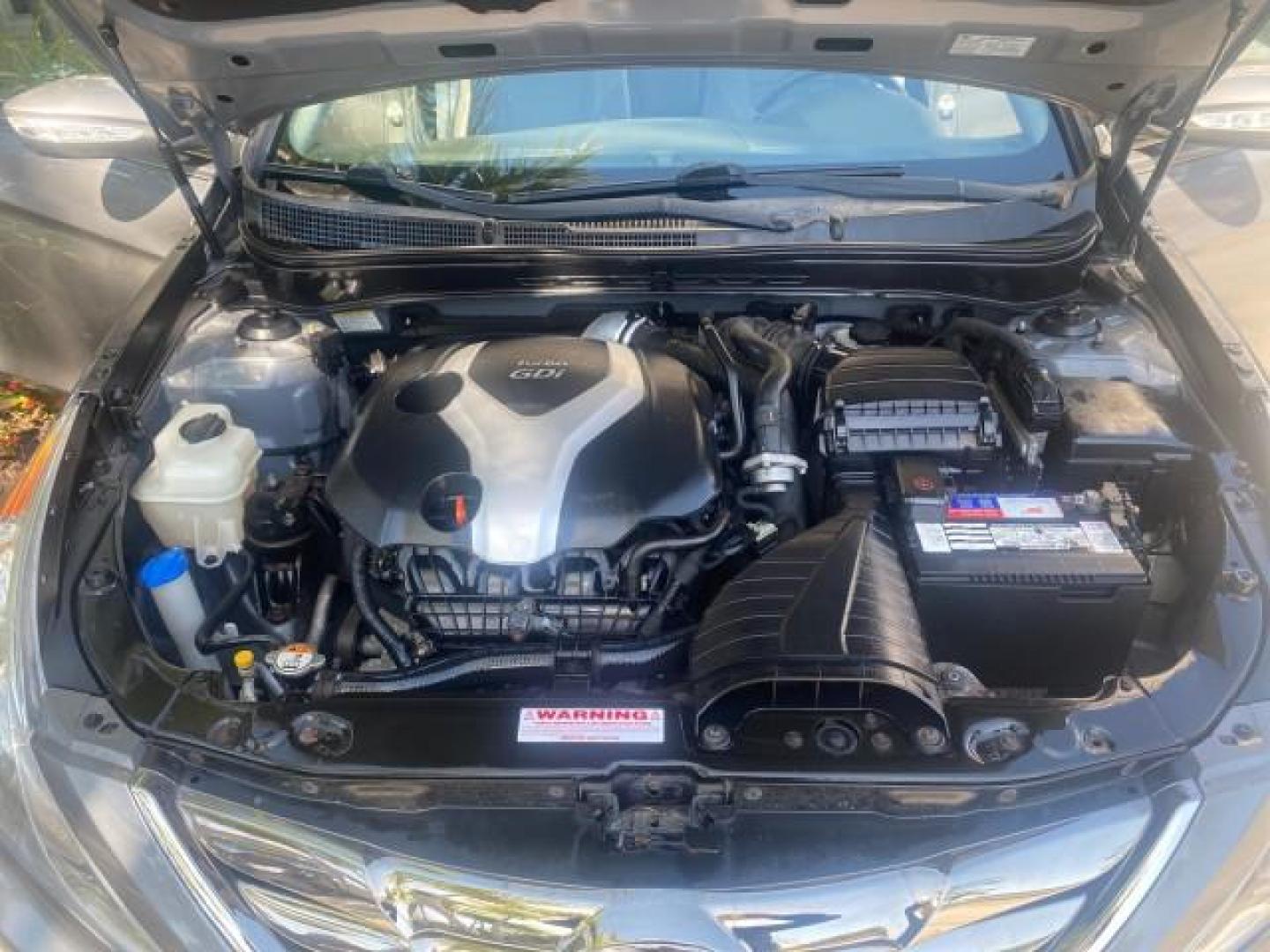 2013 Harbor Gray Metallic /Gray Hyundai Sonata Limited 29 SERVICES FL (5NPEC4AB5DH) with an 2.0L DOHC 16-Valve I4 Turbocharged GDI Engine engine, Automatic transmission, located at 4701 North Dixie Hwy, Pompano Beach, FL, 33064, (954) 422-2889, 26.240938, -80.123474 - OUR WEBPAGE FLORIDACARS1.COM HAS OVER 100 PHOTOS AND FREE CARFAX LINK 2013 HYUNDAI SONATA SE 2.0T VIN: 5NPEC4AB5DH558214 5 N P E C 4 A B 5 D H 5 5 8 2 1 4 SEDAN 4 DR 2.0L I4 F DOHC 16V GASOLINE FRONT WHEEL DRIVE Highlighted Features Sunroof CD Player Leather Seats Alloy Wheels Power Windows Power Lo - Photo#17