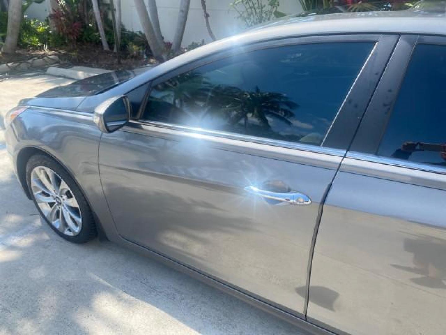 2013 Harbor Gray Metallic /Gray Hyundai Sonata Limited 29 SERVICES FL (5NPEC4AB5DH) with an 2.0L DOHC 16-Valve I4 Turbocharged GDI Engine engine, Automatic transmission, located at 4701 North Dixie Hwy, Pompano Beach, FL, 33064, (954) 422-2889, 26.240938, -80.123474 - OUR WEBPAGE FLORIDACARS1.COM HAS OVER 100 PHOTOS AND FREE CARFAX LINK 2013 HYUNDAI SONATA SE 2.0T VIN: 5NPEC4AB5DH558214 5 N P E C 4 A B 5 D H 5 5 8 2 1 4 SEDAN 4 DR 2.0L I4 F DOHC 16V GASOLINE FRONT WHEEL DRIVE Highlighted Features Sunroof CD Player Leather Seats Alloy Wheels Power Windows Power Lo - Photo#27