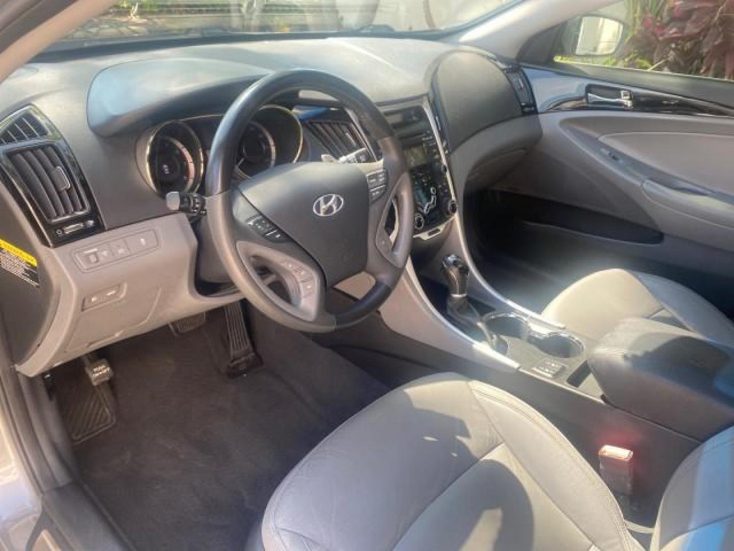 2013 Harbor Gray Metallic /Gray Hyundai Sonata Limited 29 SERVICES FL (5NPEC4AB5DH) with an 2.0L DOHC 16-Valve I4 Turbocharged GDI Engine engine, Automatic transmission, located at 4701 North Dixie Hwy, Pompano Beach, FL, 33064, (954) 422-2889, 26.240938, -80.123474 - OUR WEBPAGE FLORIDACARS1.COM HAS OVER 100 PHOTOS AND FREE CARFAX LINK 2013 HYUNDAI SONATA SE 2.0T VIN: 5NPEC4AB5DH558214 5 N P E C 4 A B 5 D H 5 5 8 2 1 4 SEDAN 4 DR 2.0L I4 F DOHC 16V GASOLINE FRONT WHEEL DRIVE Highlighted Features Sunroof CD Player Leather Seats Alloy Wheels Power Windows Power Lo - Photo#32