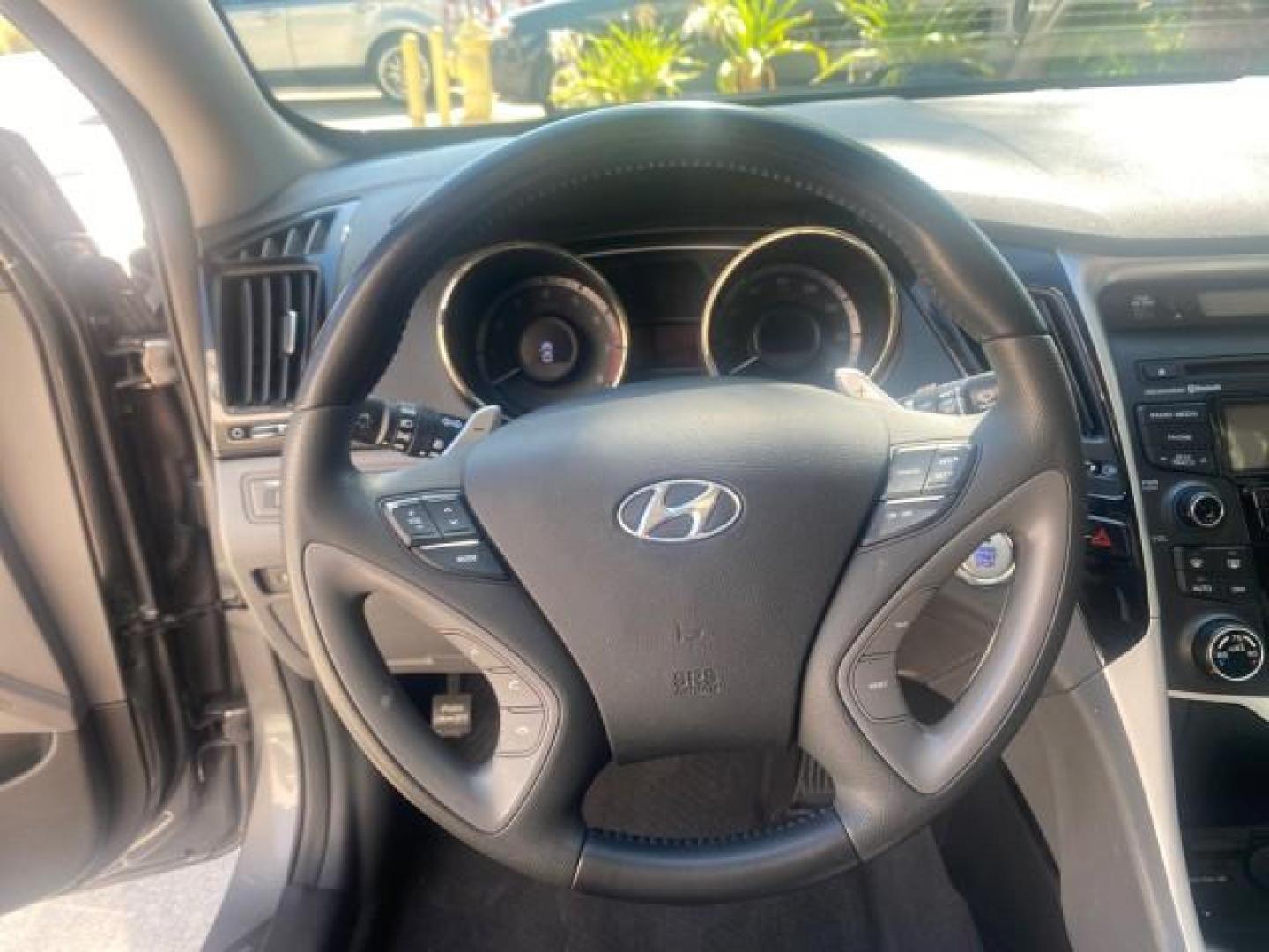 2013 Harbor Gray Metallic /Gray Hyundai Sonata Limited 29 SERVICES FL (5NPEC4AB5DH) with an 2.0L DOHC 16-Valve I4 Turbocharged GDI Engine engine, Automatic transmission, located at 4701 North Dixie Hwy, Pompano Beach, FL, 33064, (954) 422-2889, 26.240938, -80.123474 - OUR WEBPAGE FLORIDACARS1.COM HAS OVER 100 PHOTOS AND FREE CARFAX LINK 2013 HYUNDAI SONATA SE 2.0T VIN: 5NPEC4AB5DH558214 5 N P E C 4 A B 5 D H 5 5 8 2 1 4 SEDAN 4 DR 2.0L I4 F DOHC 16V GASOLINE FRONT WHEEL DRIVE Highlighted Features Sunroof CD Player Leather Seats Alloy Wheels Power Windows Power Lo - Photo#33