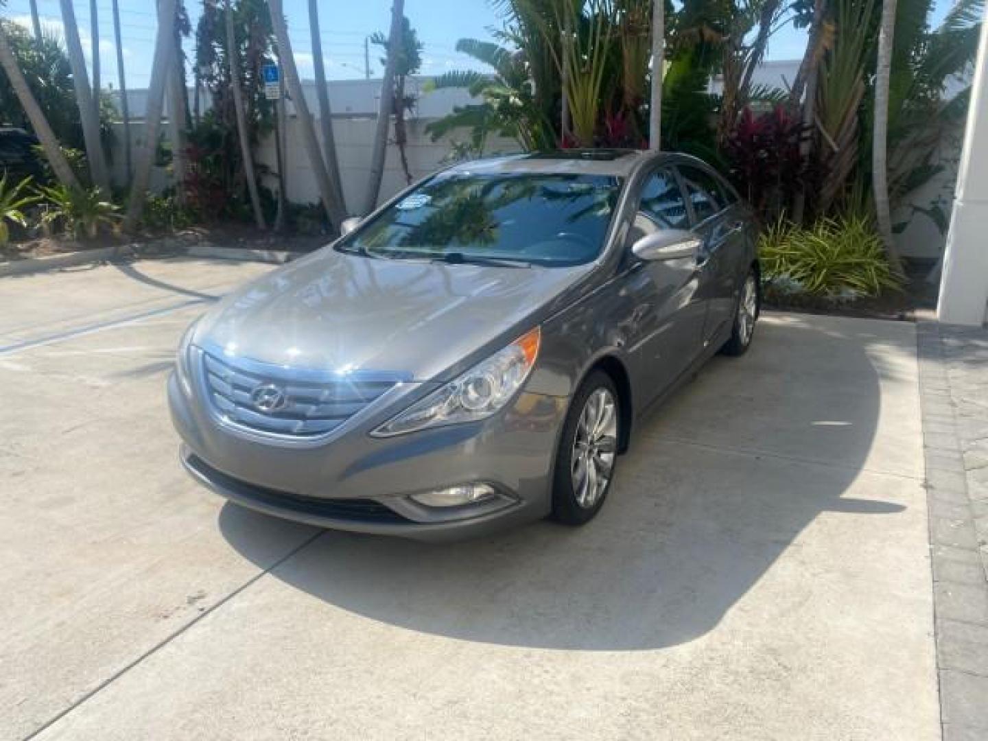 2013 Harbor Gray Metallic /Gray Hyundai Sonata Limited 29 SERVICES FL (5NPEC4AB5DH) with an 2.0L DOHC 16-Valve I4 Turbocharged GDI Engine engine, Automatic transmission, located at 4701 North Dixie Hwy, Pompano Beach, FL, 33064, (954) 422-2889, 26.240938, -80.123474 - OUR WEBPAGE FLORIDACARS1.COM HAS OVER 100 PHOTOS AND FREE CARFAX LINK 2013 HYUNDAI SONATA SE 2.0T VIN: 5NPEC4AB5DH558214 5 N P E C 4 A B 5 D H 5 5 8 2 1 4 SEDAN 4 DR 2.0L I4 F DOHC 16V GASOLINE FRONT WHEEL DRIVE Highlighted Features Sunroof CD Player Leather Seats Alloy Wheels Power Windows Power Lo - Photo#3