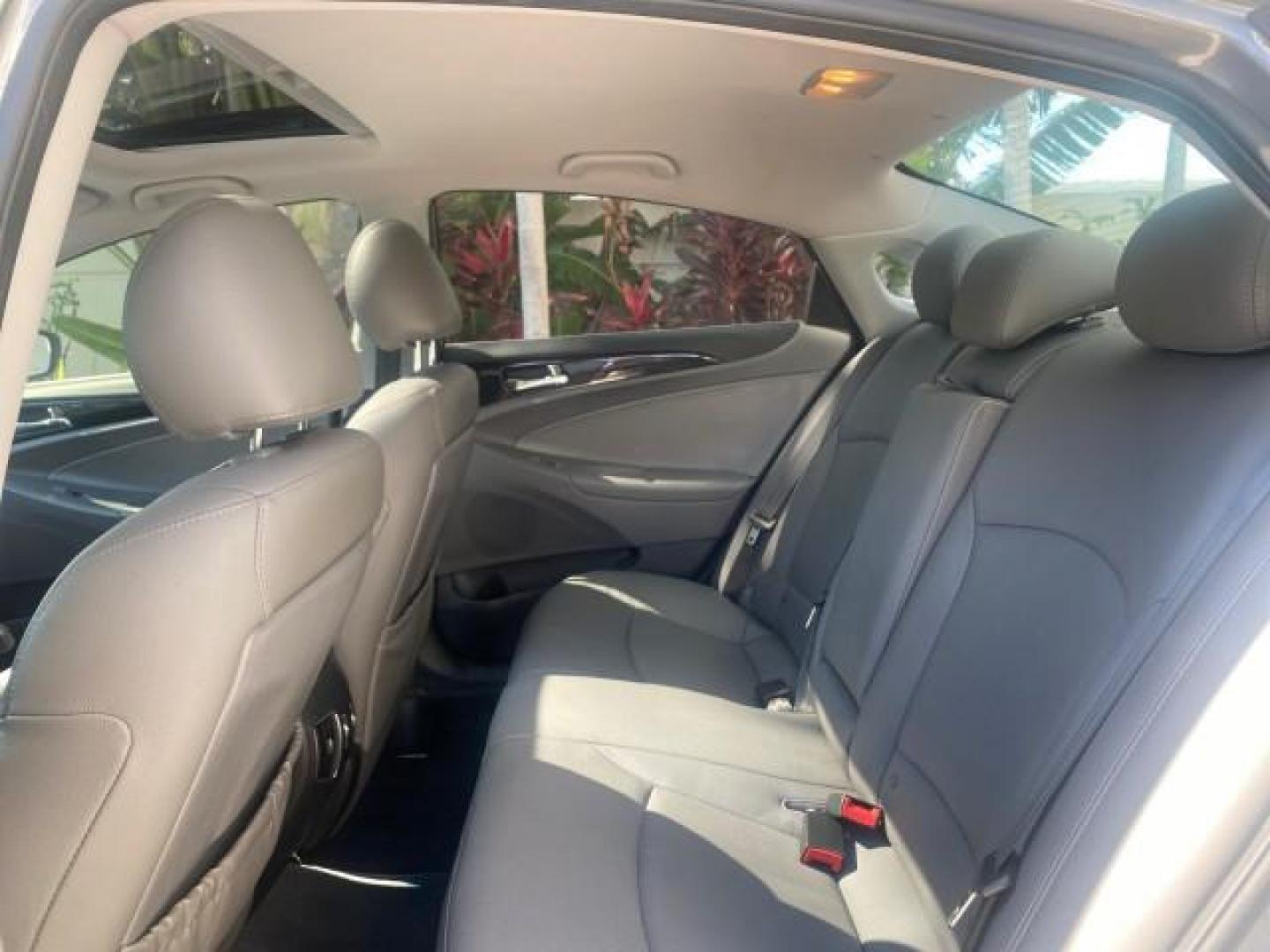 2013 Harbor Gray Metallic /Gray Hyundai Sonata Limited 29 SERVICES FL (5NPEC4AB5DH) with an 2.0L DOHC 16-Valve I4 Turbocharged GDI Engine engine, Automatic transmission, located at 4701 North Dixie Hwy, Pompano Beach, FL, 33064, (954) 422-2889, 26.240938, -80.123474 - OUR WEBPAGE FLORIDACARS1.COM HAS OVER 100 PHOTOS AND FREE CARFAX LINK 2013 HYUNDAI SONATA SE 2.0T VIN: 5NPEC4AB5DH558214 5 N P E C 4 A B 5 D H 5 5 8 2 1 4 SEDAN 4 DR 2.0L I4 F DOHC 16V GASOLINE FRONT WHEEL DRIVE Highlighted Features Sunroof CD Player Leather Seats Alloy Wheels Power Windows Power Lo - Photo#61