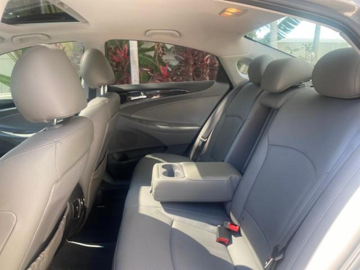 2013 Harbor Gray Metallic /Gray Hyundai Sonata Limited 29 SERVICES FL (5NPEC4AB5DH) with an 2.0L DOHC 16-Valve I4 Turbocharged GDI Engine engine, Automatic transmission, located at 4701 North Dixie Hwy, Pompano Beach, FL, 33064, (954) 422-2889, 26.240938, -80.123474 - OUR WEBPAGE FLORIDACARS1.COM HAS OVER 100 PHOTOS AND FREE CARFAX LINK 2013 HYUNDAI SONATA SE 2.0T VIN: 5NPEC4AB5DH558214 5 N P E C 4 A B 5 D H 5 5 8 2 1 4 SEDAN 4 DR 2.0L I4 F DOHC 16V GASOLINE FRONT WHEEL DRIVE Highlighted Features Sunroof CD Player Leather Seats Alloy Wheels Power Windows Power Lo - Photo#62
