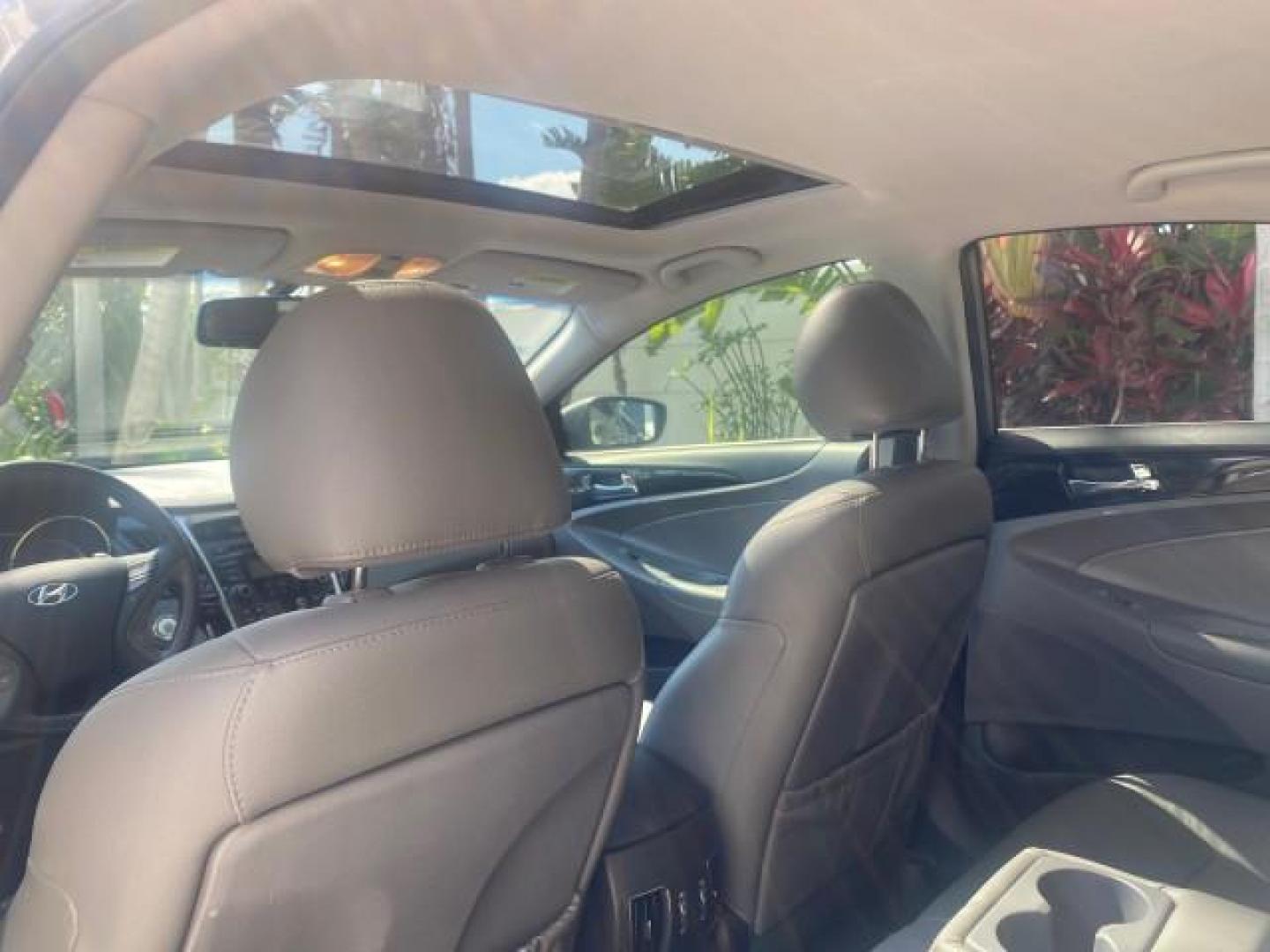 2013 Harbor Gray Metallic /Gray Hyundai Sonata Limited 29 SERVICES FL (5NPEC4AB5DH) with an 2.0L DOHC 16-Valve I4 Turbocharged GDI Engine engine, Automatic transmission, located at 4701 North Dixie Hwy, Pompano Beach, FL, 33064, (954) 422-2889, 26.240938, -80.123474 - OUR WEBPAGE FLORIDACARS1.COM HAS OVER 100 PHOTOS AND FREE CARFAX LINK 2013 HYUNDAI SONATA SE 2.0T VIN: 5NPEC4AB5DH558214 5 N P E C 4 A B 5 D H 5 5 8 2 1 4 SEDAN 4 DR 2.0L I4 F DOHC 16V GASOLINE FRONT WHEEL DRIVE Highlighted Features Sunroof CD Player Leather Seats Alloy Wheels Power Windows Power Lo - Photo#63