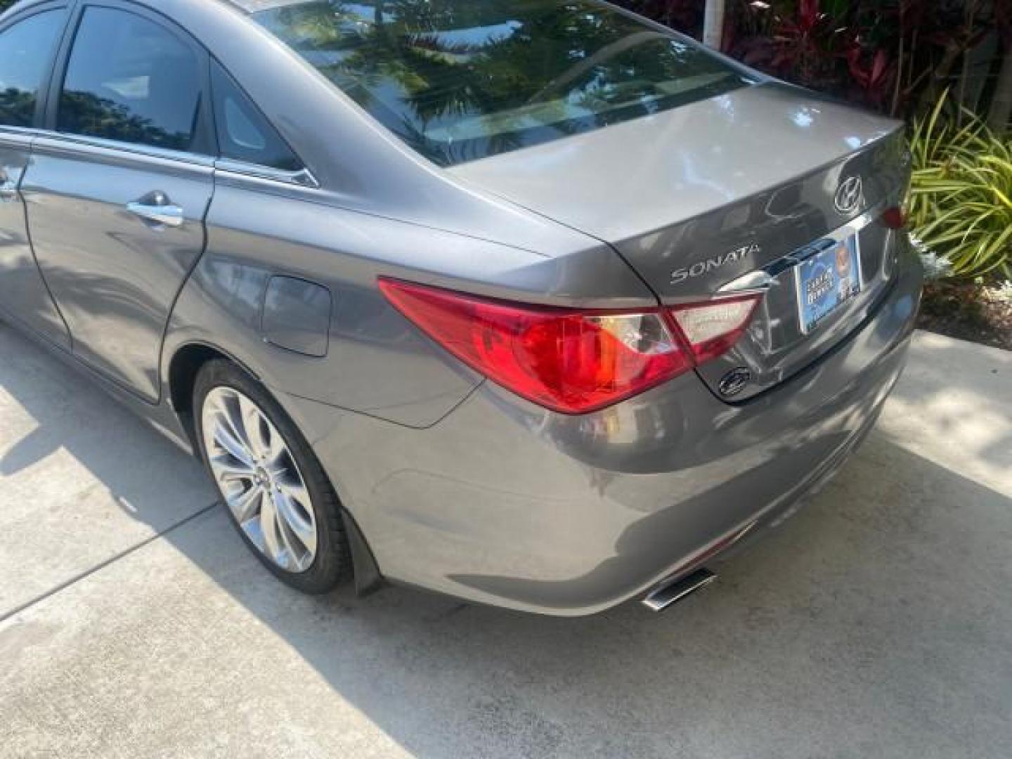2013 Harbor Gray Metallic /Gray Hyundai Sonata Limited 29 SERVICES FL (5NPEC4AB5DH) with an 2.0L DOHC 16-Valve I4 Turbocharged GDI Engine engine, Automatic transmission, located at 4701 North Dixie Hwy, Pompano Beach, FL, 33064, (954) 422-2889, 26.240938, -80.123474 - OUR WEBPAGE FLORIDACARS1.COM HAS OVER 100 PHOTOS AND FREE CARFAX LINK 2013 HYUNDAI SONATA SE 2.0T VIN: 5NPEC4AB5DH558214 5 N P E C 4 A B 5 D H 5 5 8 2 1 4 SEDAN 4 DR 2.0L I4 F DOHC 16V GASOLINE FRONT WHEEL DRIVE Highlighted Features Sunroof CD Player Leather Seats Alloy Wheels Power Windows Power Lo - Photo#73