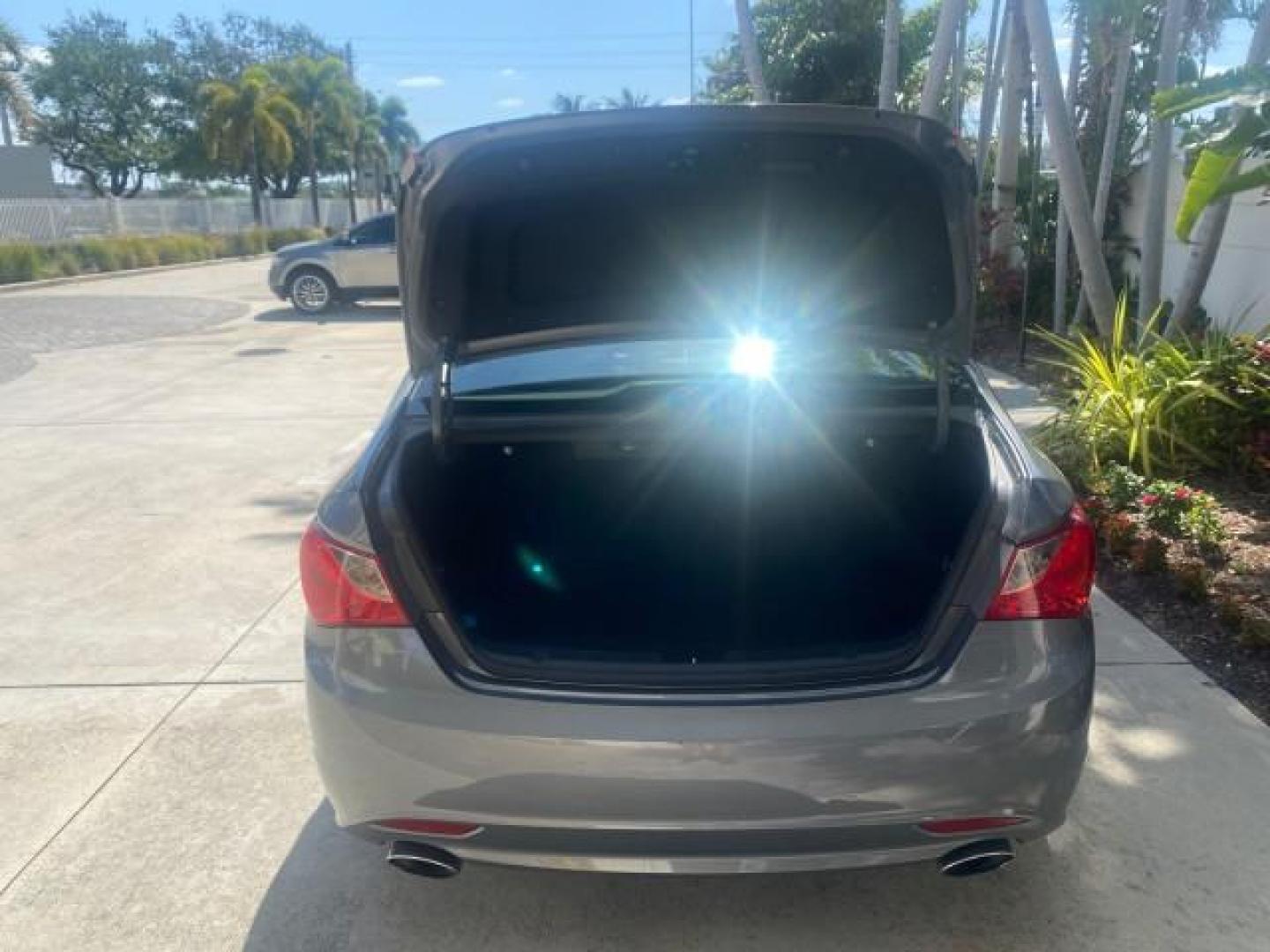 2013 Harbor Gray Metallic /Gray Hyundai Sonata Limited 29 SERVICES FL (5NPEC4AB5DH) with an 2.0L DOHC 16-Valve I4 Turbocharged GDI Engine engine, Automatic transmission, located at 4701 North Dixie Hwy, Pompano Beach, FL, 33064, (954) 422-2889, 26.240938, -80.123474 - OUR WEBPAGE FLORIDACARS1.COM HAS OVER 100 PHOTOS AND FREE CARFAX LINK 2013 HYUNDAI SONATA SE 2.0T VIN: 5NPEC4AB5DH558214 5 N P E C 4 A B 5 D H 5 5 8 2 1 4 SEDAN 4 DR 2.0L I4 F DOHC 16V GASOLINE FRONT WHEEL DRIVE Highlighted Features Sunroof CD Player Leather Seats Alloy Wheels Power Windows Power Lo - Photo#78