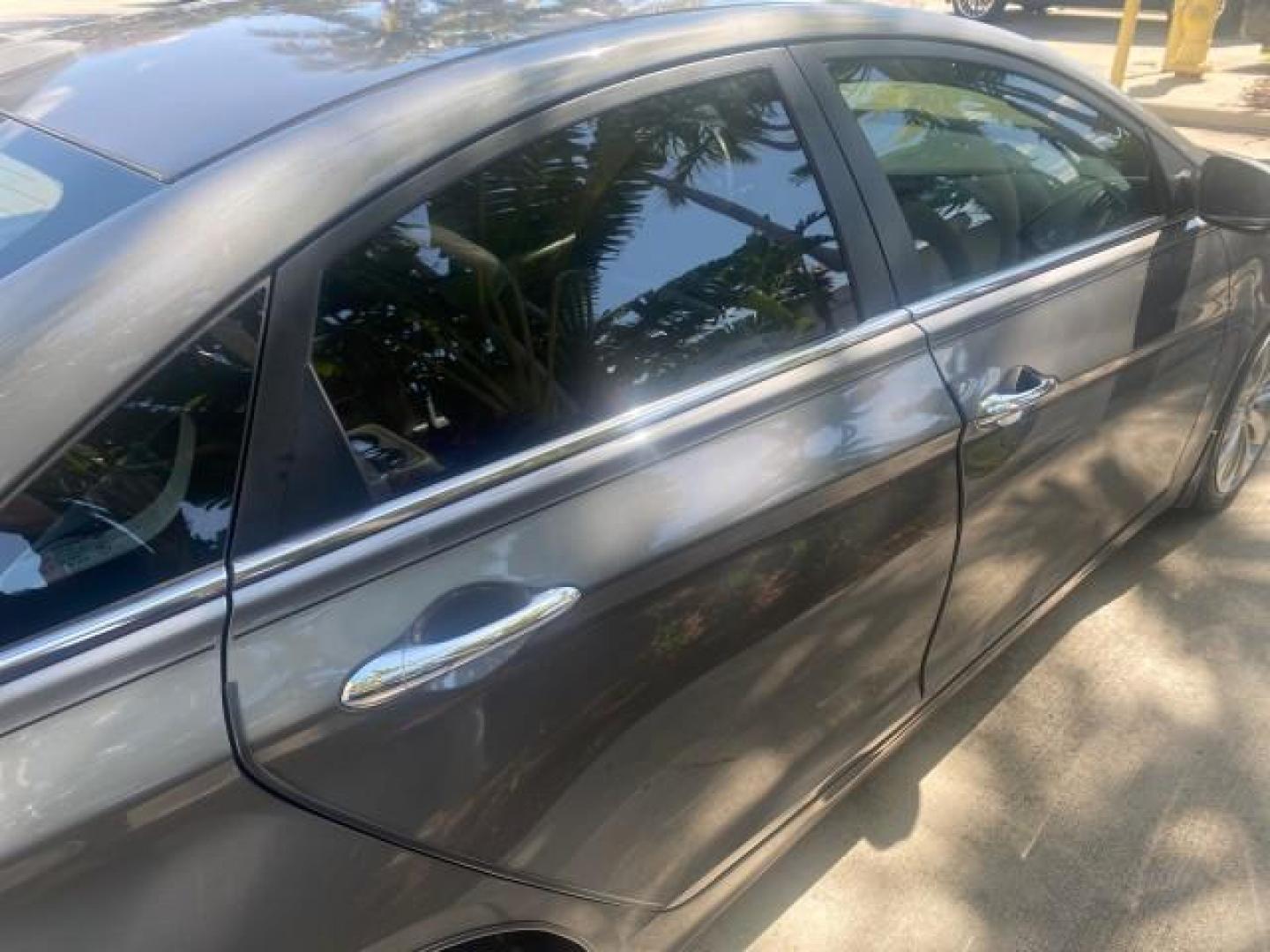 2013 Harbor Gray Metallic /Gray Hyundai Sonata Limited 29 SERVICES FL (5NPEC4AB5DH) with an 2.0L DOHC 16-Valve I4 Turbocharged GDI Engine engine, Automatic transmission, located at 4701 North Dixie Hwy, Pompano Beach, FL, 33064, (954) 422-2889, 26.240938, -80.123474 - OUR WEBPAGE FLORIDACARS1.COM HAS OVER 100 PHOTOS AND FREE CARFAX LINK 2013 HYUNDAI SONATA SE 2.0T VIN: 5NPEC4AB5DH558214 5 N P E C 4 A B 5 D H 5 5 8 2 1 4 SEDAN 4 DR 2.0L I4 F DOHC 16V GASOLINE FRONT WHEEL DRIVE Highlighted Features Sunroof CD Player Leather Seats Alloy Wheels Power Windows Power Lo - Photo#83