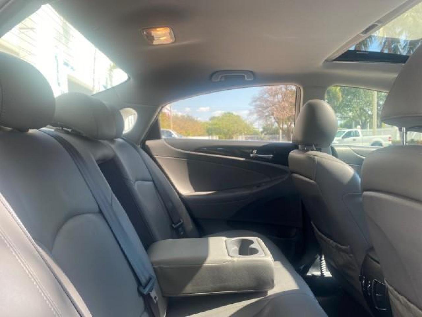 2013 Harbor Gray Metallic /Gray Hyundai Sonata Limited 29 SERVICES FL (5NPEC4AB5DH) with an 2.0L DOHC 16-Valve I4 Turbocharged GDI Engine engine, Automatic transmission, located at 4701 North Dixie Hwy, Pompano Beach, FL, 33064, (954) 422-2889, 26.240938, -80.123474 - OUR WEBPAGE FLORIDACARS1.COM HAS OVER 100 PHOTOS AND FREE CARFAX LINK 2013 HYUNDAI SONATA SE 2.0T VIN: 5NPEC4AB5DH558214 5 N P E C 4 A B 5 D H 5 5 8 2 1 4 SEDAN 4 DR 2.0L I4 F DOHC 16V GASOLINE FRONT WHEEL DRIVE Highlighted Features Sunroof CD Player Leather Seats Alloy Wheels Power Windows Power Lo - Photo#87