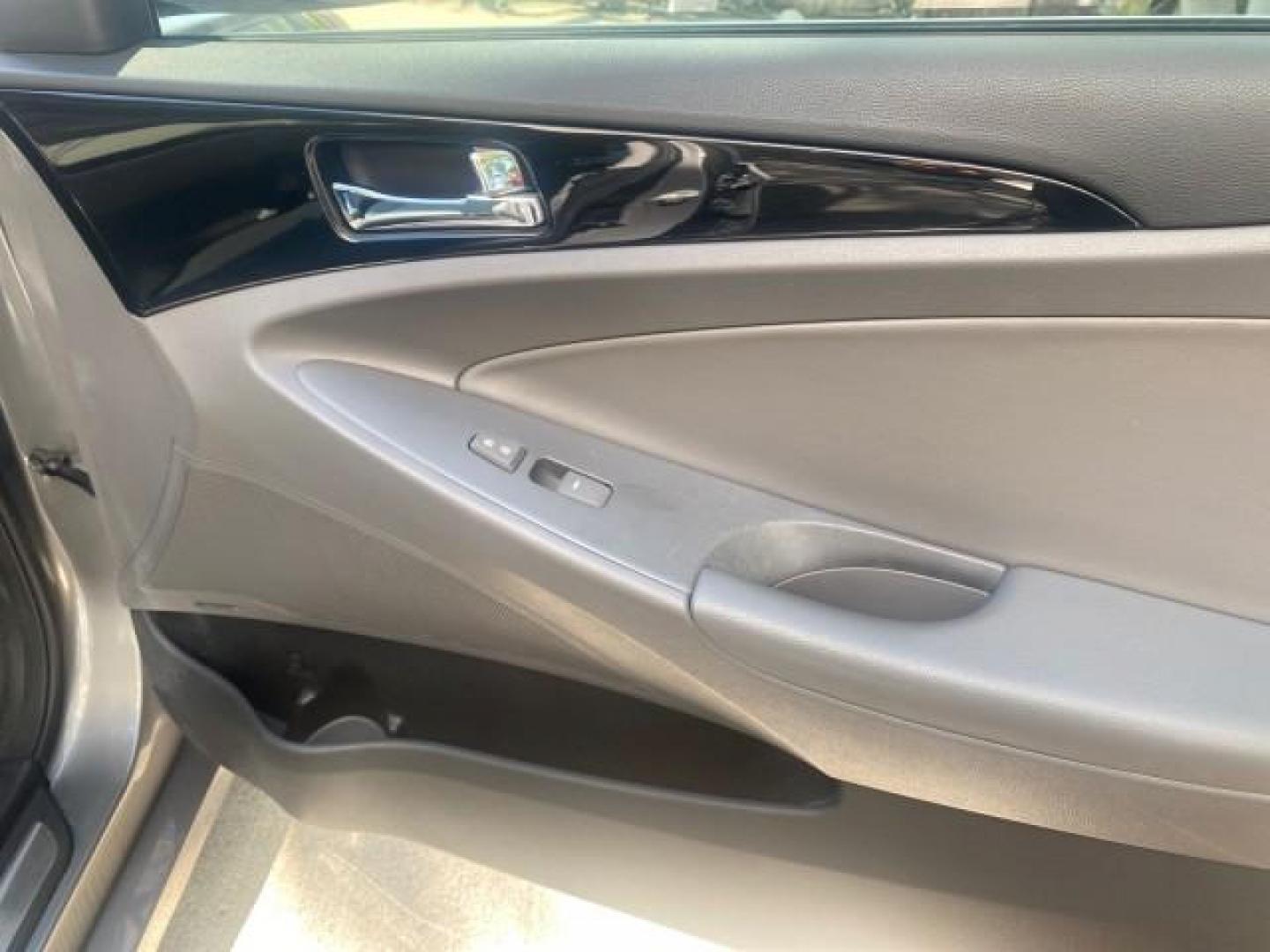 2013 Harbor Gray Metallic /Gray Hyundai Sonata Limited 29 SERVICES FL (5NPEC4AB5DH) with an 2.0L DOHC 16-Valve I4 Turbocharged GDI Engine engine, Automatic transmission, located at 4701 North Dixie Hwy, Pompano Beach, FL, 33064, (954) 422-2889, 26.240938, -80.123474 - OUR WEBPAGE FLORIDACARS1.COM HAS OVER 100 PHOTOS AND FREE CARFAX LINK 2013 HYUNDAI SONATA SE 2.0T VIN: 5NPEC4AB5DH558214 5 N P E C 4 A B 5 D H 5 5 8 2 1 4 SEDAN 4 DR 2.0L I4 F DOHC 16V GASOLINE FRONT WHEEL DRIVE Highlighted Features Sunroof CD Player Leather Seats Alloy Wheels Power Windows Power Lo - Photo#91