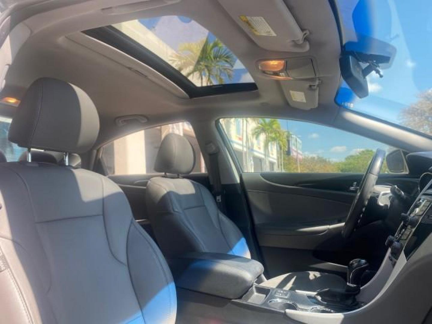 2013 Harbor Gray Metallic /Gray Hyundai Sonata Limited 29 SERVICES FL (5NPEC4AB5DH) with an 2.0L DOHC 16-Valve I4 Turbocharged GDI Engine engine, Automatic transmission, located at 4701 North Dixie Hwy, Pompano Beach, FL, 33064, (954) 422-2889, 26.240938, -80.123474 - OUR WEBPAGE FLORIDACARS1.COM HAS OVER 100 PHOTOS AND FREE CARFAX LINK 2013 HYUNDAI SONATA SE 2.0T VIN: 5NPEC4AB5DH558214 5 N P E C 4 A B 5 D H 5 5 8 2 1 4 SEDAN 4 DR 2.0L I4 F DOHC 16V GASOLINE FRONT WHEEL DRIVE Highlighted Features Sunroof CD Player Leather Seats Alloy Wheels Power Windows Power Lo - Photo#92