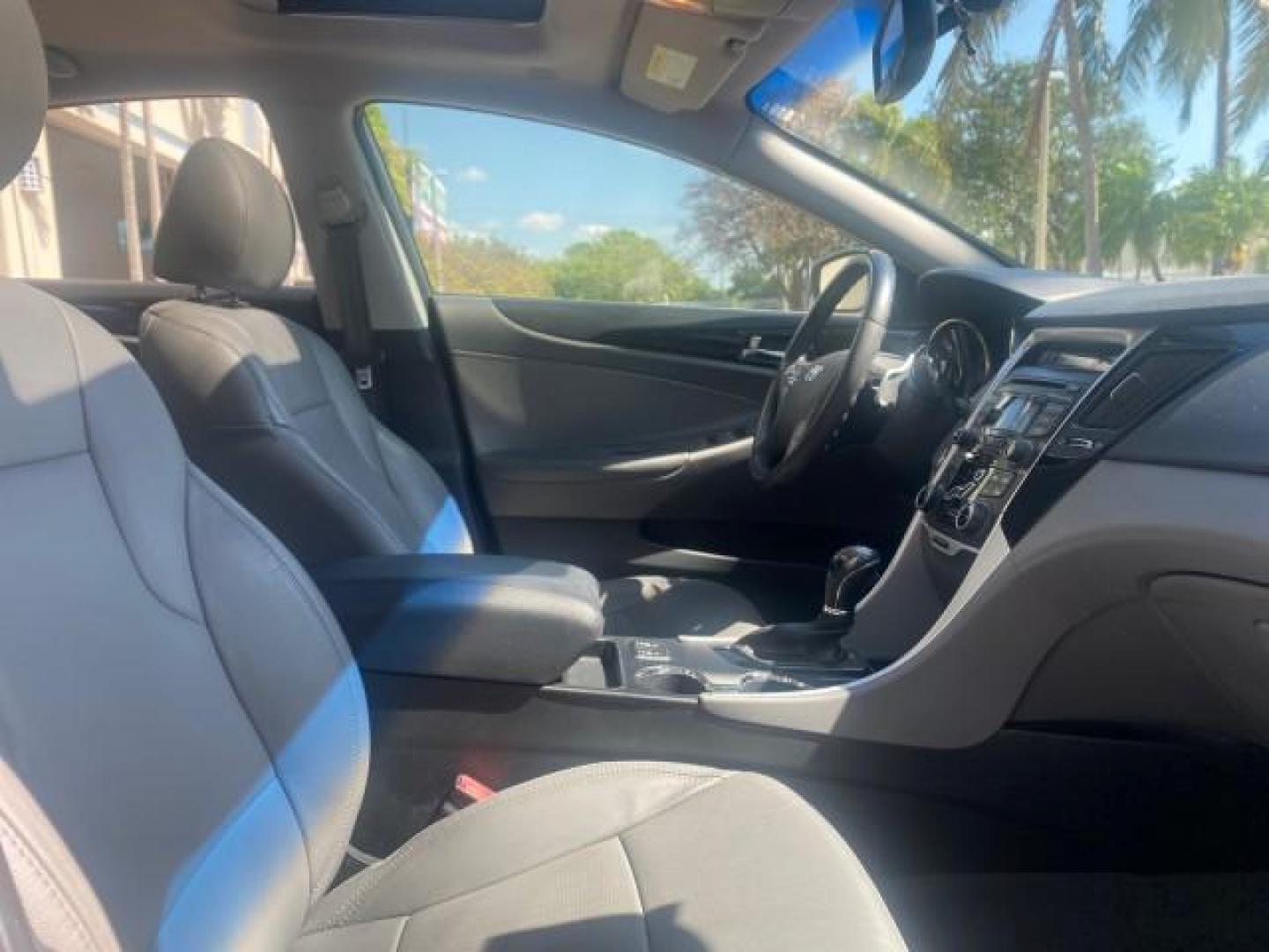2013 Harbor Gray Metallic /Gray Hyundai Sonata Limited 29 SERVICES FL (5NPEC4AB5DH) with an 2.0L DOHC 16-Valve I4 Turbocharged GDI Engine engine, Automatic transmission, located at 4701 North Dixie Hwy, Pompano Beach, FL, 33064, (954) 422-2889, 26.240938, -80.123474 - OUR WEBPAGE FLORIDACARS1.COM HAS OVER 100 PHOTOS AND FREE CARFAX LINK 2013 HYUNDAI SONATA SE 2.0T VIN: 5NPEC4AB5DH558214 5 N P E C 4 A B 5 D H 5 5 8 2 1 4 SEDAN 4 DR 2.0L I4 F DOHC 16V GASOLINE FRONT WHEEL DRIVE Highlighted Features Sunroof CD Player Leather Seats Alloy Wheels Power Windows Power Lo - Photo#94