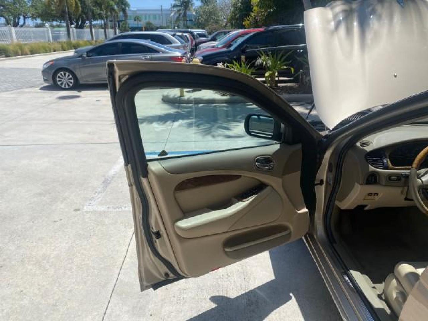2001 Roman Bronze /Ivory Jaguar S-TYPE V8 4.0 LOW MILES 49,009 (SAJDA01P01G) with an 4.0L DOHC SMPI 32-Valve Aluminum Alloy V8 Engine engine, Automatic transmission, located at 4701 North Dixie Hwy, Pompano Beach, FL, 33064, (954) 422-2889, 26.240938, -80.123474 - OUR WEBPAGE FLORIDACARS1.COM HAS OVER 100 PHOTOS AND FREE CARFAX LINK 2001 JAGUAR S-TYPE 4.0 $ 49,355 NEW VIN: SAJDA01P01GM10625 S A J D A 0 1 P 0 1 G M 1 0 6 2 5 SEDAN 4 DR 4.0L V8 F DOHC 32V GASOLINE REAR WHEEL DRIVE Top Features Alloy Wheels Navigation System Front Seat Heaters Parking Sensors Le - Photo#9