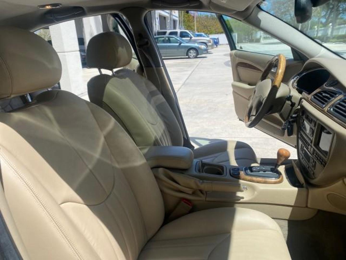 2001 Roman Bronze /Ivory Jaguar S-TYPE V8 4.0 LOW MILES 49,009 (SAJDA01P01G) with an 4.0L DOHC SMPI 32-Valve Aluminum Alloy V8 Engine engine, Automatic transmission, located at 4701 North Dixie Hwy, Pompano Beach, FL, 33064, (954) 422-2889, 26.240938, -80.123474 - OUR WEBPAGE FLORIDACARS1.COM HAS OVER 100 PHOTOS AND FREE CARFAX LINK 2001 JAGUAR S-TYPE 4.0 $ 49,355 NEW VIN: SAJDA01P01GM10625 S A J D A 0 1 P 0 1 G M 1 0 6 2 5 SEDAN 4 DR 4.0L V8 F DOHC 32V GASOLINE REAR WHEEL DRIVE Top Features Alloy Wheels Navigation System Front Seat Heaters Parking Sensors Le - Photo#12