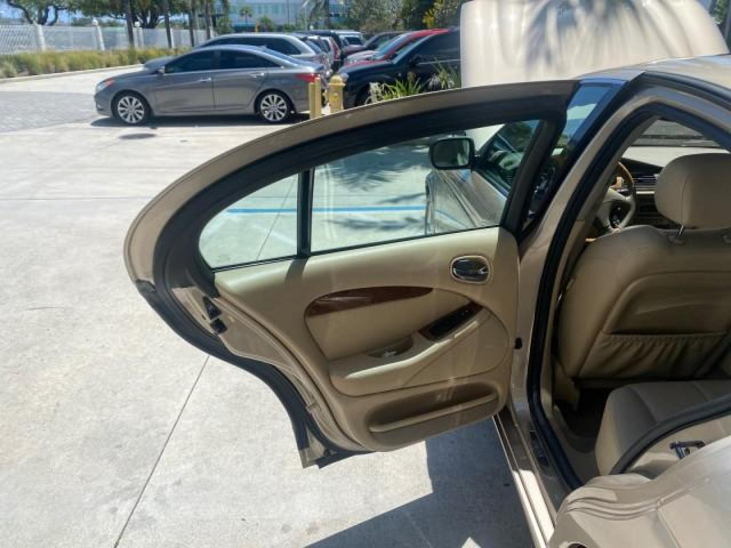 2001 Roman Bronze /Ivory Jaguar S-TYPE V8 4.0 LOW MILES 49,009 (SAJDA01P01G) with an 4.0L DOHC SMPI 32-Valve Aluminum Alloy V8 Engine engine, Automatic transmission, located at 4701 North Dixie Hwy, Pompano Beach, FL, 33064, (954) 422-2889, 26.240938, -80.123474 - OUR WEBPAGE FLORIDACARS1.COM HAS OVER 100 PHOTOS AND FREE CARFAX LINK 2001 JAGUAR S-TYPE 4.0 $ 49,355 NEW VIN: SAJDA01P01GM10625 S A J D A 0 1 P 0 1 G M 1 0 6 2 5 SEDAN 4 DR 4.0L V8 F DOHC 32V GASOLINE REAR WHEEL DRIVE Top Features Alloy Wheels Navigation System Front Seat Heaters Parking Sensors Le - Photo#13