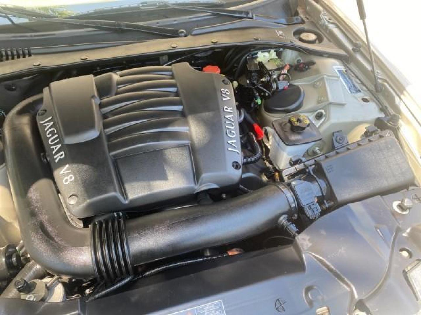 2001 Roman Bronze /Ivory Jaguar S-TYPE V8 4.0 LOW MILES 49,009 (SAJDA01P01G) with an 4.0L DOHC SMPI 32-Valve Aluminum Alloy V8 Engine engine, Automatic transmission, located at 4701 North Dixie Hwy, Pompano Beach, FL, 33064, (954) 422-2889, 26.240938, -80.123474 - OUR WEBPAGE FLORIDACARS1.COM HAS OVER 100 PHOTOS AND FREE CARFAX LINK 2001 JAGUAR S-TYPE 4.0 $ 49,355 NEW VIN: SAJDA01P01GM10625 S A J D A 0 1 P 0 1 G M 1 0 6 2 5 SEDAN 4 DR 4.0L V8 F DOHC 32V GASOLINE REAR WHEEL DRIVE Top Features Alloy Wheels Navigation System Front Seat Heaters Parking Sensors Le - Photo#26