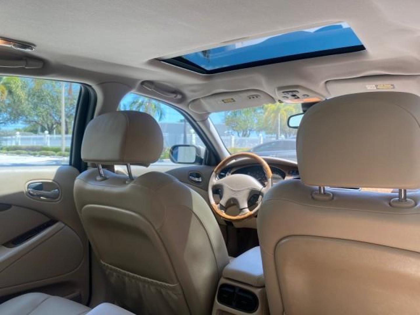 2001 Roman Bronze /Ivory Jaguar S-TYPE V8 4.0 LOW MILES 49,009 (SAJDA01P01G) with an 4.0L DOHC SMPI 32-Valve Aluminum Alloy V8 Engine engine, Automatic transmission, located at 4701 North Dixie Hwy, Pompano Beach, FL, 33064, (954) 422-2889, 26.240938, -80.123474 - OUR WEBPAGE FLORIDACARS1.COM HAS OVER 100 PHOTOS AND FREE CARFAX LINK 2001 JAGUAR S-TYPE 4.0 $ 49,355 NEW VIN: SAJDA01P01GM10625 S A J D A 0 1 P 0 1 G M 1 0 6 2 5 SEDAN 4 DR 4.0L V8 F DOHC 32V GASOLINE REAR WHEEL DRIVE Top Features Alloy Wheels Navigation System Front Seat Heaters Parking Sensors Le - Photo#89
