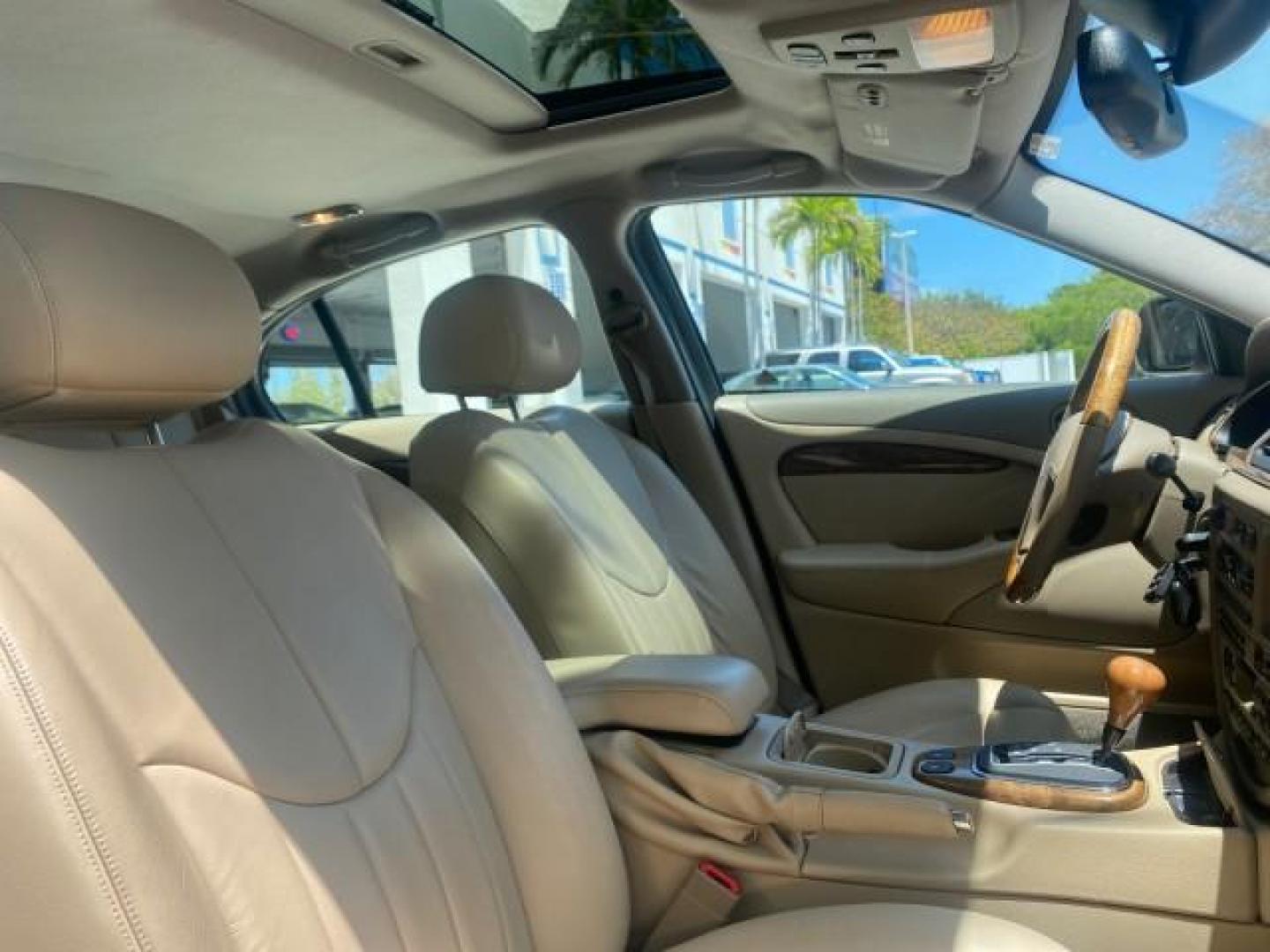 2001 Roman Bronze /Ivory Jaguar S-TYPE V8 4.0 LOW MILES 49,009 (SAJDA01P01G) with an 4.0L DOHC SMPI 32-Valve Aluminum Alloy V8 Engine engine, Automatic transmission, located at 4701 North Dixie Hwy, Pompano Beach, FL, 33064, (954) 422-2889, 26.240938, -80.123474 - OUR WEBPAGE FLORIDACARS1.COM HAS OVER 100 PHOTOS AND FREE CARFAX LINK 2001 JAGUAR S-TYPE 4.0 $ 49,355 NEW VIN: SAJDA01P01GM10625 S A J D A 0 1 P 0 1 G M 1 0 6 2 5 SEDAN 4 DR 4.0L V8 F DOHC 32V GASOLINE REAR WHEEL DRIVE Top Features Alloy Wheels Navigation System Front Seat Heaters Parking Sensors Le - Photo#94