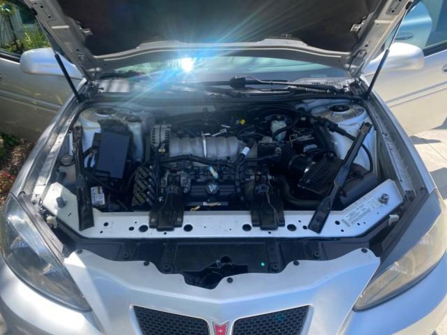2004 Greystone Metallic /Dark Pewter Pontiac Grand Prix GT2 LOW MILES 76,788 1 OWNER FL (2G2WS522041) with an 3.8L 3800 Series Iii V6 SFI Engine engine, Automatic transmission, located at 4701 North Dixie Hwy, Pompano Beach, FL, 33064, (954) 422-2889, 26.240938, -80.123474 - OUR WEBPAGE FLORIDACARS1.COM HAS OVER 100 PHOTOS AND FREE CARFAX LINK 2004 PONTIAC GRAND PRIX GT2 VIN: 2G2WS522041302919 2 G 2 W S 5 2 2 0 4 1 3 0 2 9 1 9 SEDAN 4 DR 3.8L V6 F 30 MPG THE BEST GASOLINE FRONT WHEEL DRIVE Top Features Alloy Wheels Cloth Seats Basic Features ABS Brakes CD Audio Power Mi - Photo#17