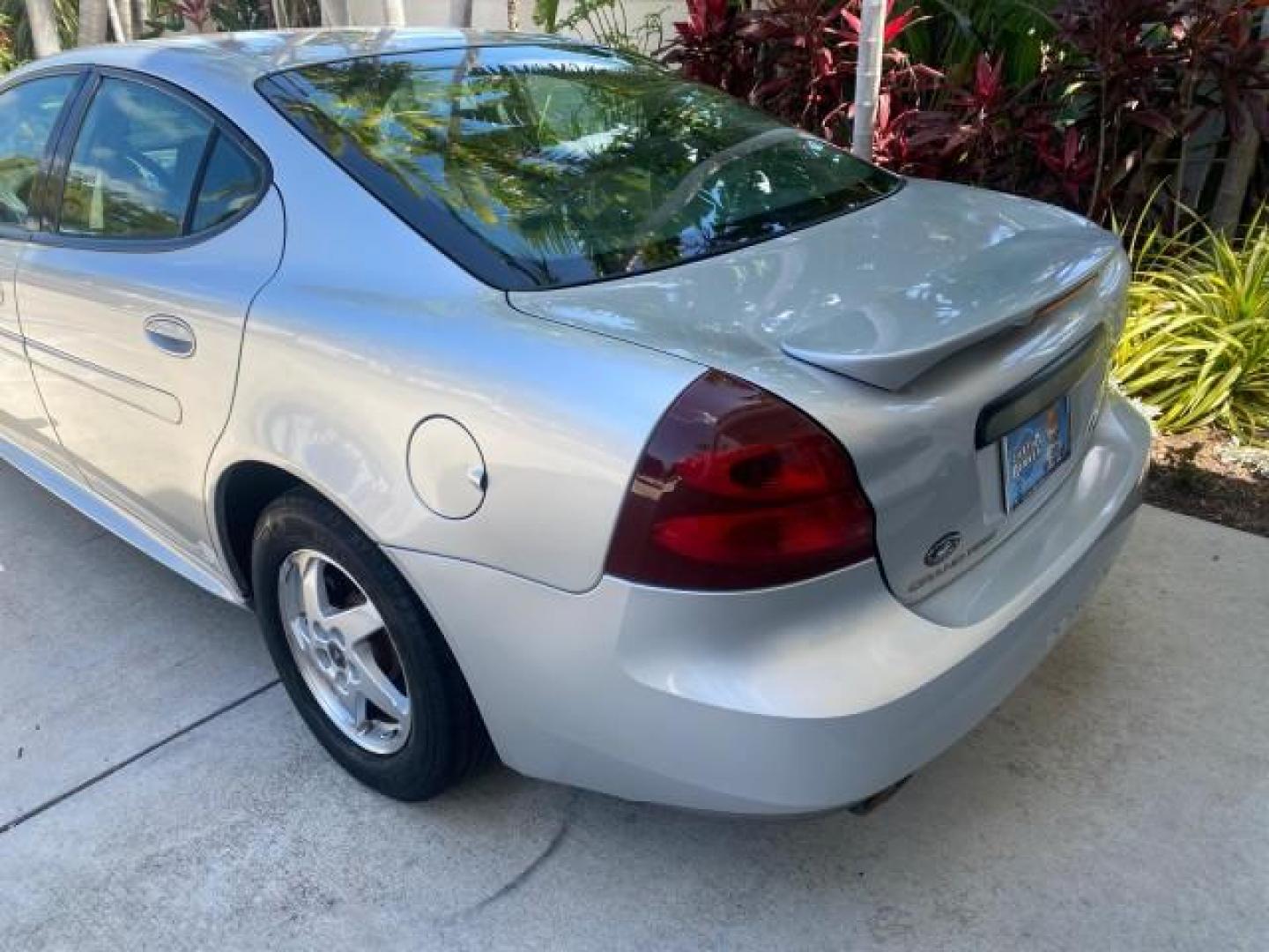 2004 Greystone Metallic /Dark Pewter Pontiac Grand Prix GT2 LOW MILES 76,788 1 OWNER FL (2G2WS522041) with an 3.8L 3800 Series Iii V6 SFI Engine engine, Automatic transmission, located at 4701 North Dixie Hwy, Pompano Beach, FL, 33064, (954) 422-2889, 26.240938, -80.123474 - OUR WEBPAGE FLORIDACARS1.COM HAS OVER 100 PHOTOS AND FREE CARFAX LINK 2004 PONTIAC GRAND PRIX GT2 VIN: 2G2WS522041302919 2 G 2 W S 5 2 2 0 4 1 3 0 2 9 1 9 SEDAN 4 DR 3.8L V6 F 30 MPG THE BEST GASOLINE FRONT WHEEL DRIVE Top Features Alloy Wheels Cloth Seats Basic Features ABS Brakes CD Audio Power Mi - Photo#70