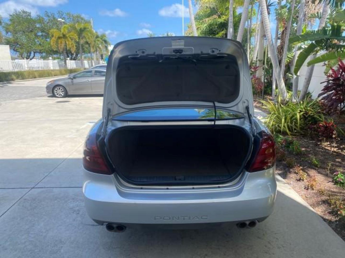2004 Greystone Metallic /Dark Pewter Pontiac Grand Prix GT2 LOW MILES 76,788 1 OWNER FL (2G2WS522041) with an 3.8L 3800 Series Iii V6 SFI Engine engine, Automatic transmission, located at 4701 North Dixie Hwy, Pompano Beach, FL, 33064, (954) 422-2889, 26.240938, -80.123474 - OUR WEBPAGE FLORIDACARS1.COM HAS OVER 100 PHOTOS AND FREE CARFAX LINK 2004 PONTIAC GRAND PRIX GT2 VIN: 2G2WS522041302919 2 G 2 W S 5 2 2 0 4 1 3 0 2 9 1 9 SEDAN 4 DR 3.8L V6 F 30 MPG THE BEST GASOLINE FRONT WHEEL DRIVE Top Features Alloy Wheels Cloth Seats Basic Features ABS Brakes CD Audio Power Mi - Photo#75