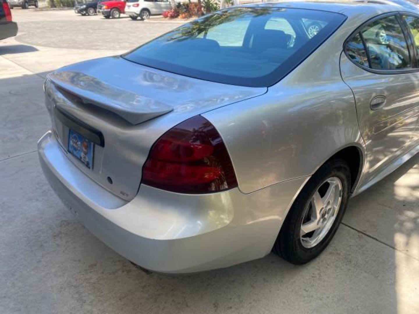 2004 Greystone Metallic /Dark Pewter Pontiac Grand Prix GT2 LOW MILES 76,788 1 OWNER FL (2G2WS522041) with an 3.8L 3800 Series Iii V6 SFI Engine engine, Automatic transmission, located at 4701 North Dixie Hwy, Pompano Beach, FL, 33064, (954) 422-2889, 26.240938, -80.123474 - OUR WEBPAGE FLORIDACARS1.COM HAS OVER 100 PHOTOS AND FREE CARFAX LINK 2004 PONTIAC GRAND PRIX GT2 VIN: 2G2WS522041302919 2 G 2 W S 5 2 2 0 4 1 3 0 2 9 1 9 SEDAN 4 DR 3.8L V6 F 30 MPG THE BEST GASOLINE FRONT WHEEL DRIVE Top Features Alloy Wheels Cloth Seats Basic Features ABS Brakes CD Audio Power Mi - Photo#77