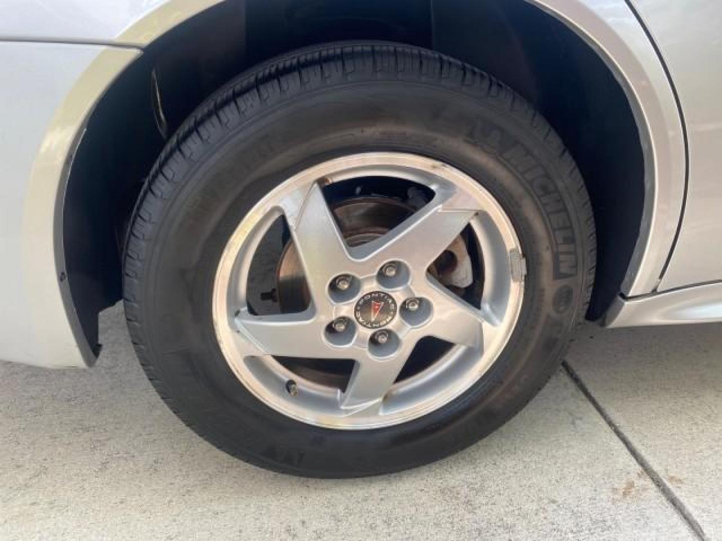 2004 Greystone Metallic /Dark Pewter Pontiac Grand Prix GT2 LOW MILES 76,788 1 OWNER FL (2G2WS522041) with an 3.8L 3800 Series Iii V6 SFI Engine engine, Automatic transmission, located at 4701 North Dixie Hwy, Pompano Beach, FL, 33064, (954) 422-2889, 26.240938, -80.123474 - OUR WEBPAGE FLORIDACARS1.COM HAS OVER 100 PHOTOS AND FREE CARFAX LINK 2004 PONTIAC GRAND PRIX GT2 VIN: 2G2WS522041302919 2 G 2 W S 5 2 2 0 4 1 3 0 2 9 1 9 SEDAN 4 DR 3.8L V6 F 30 MPG THE BEST GASOLINE FRONT WHEEL DRIVE Top Features Alloy Wheels Cloth Seats Basic Features ABS Brakes CD Audio Power Mi - Photo#78