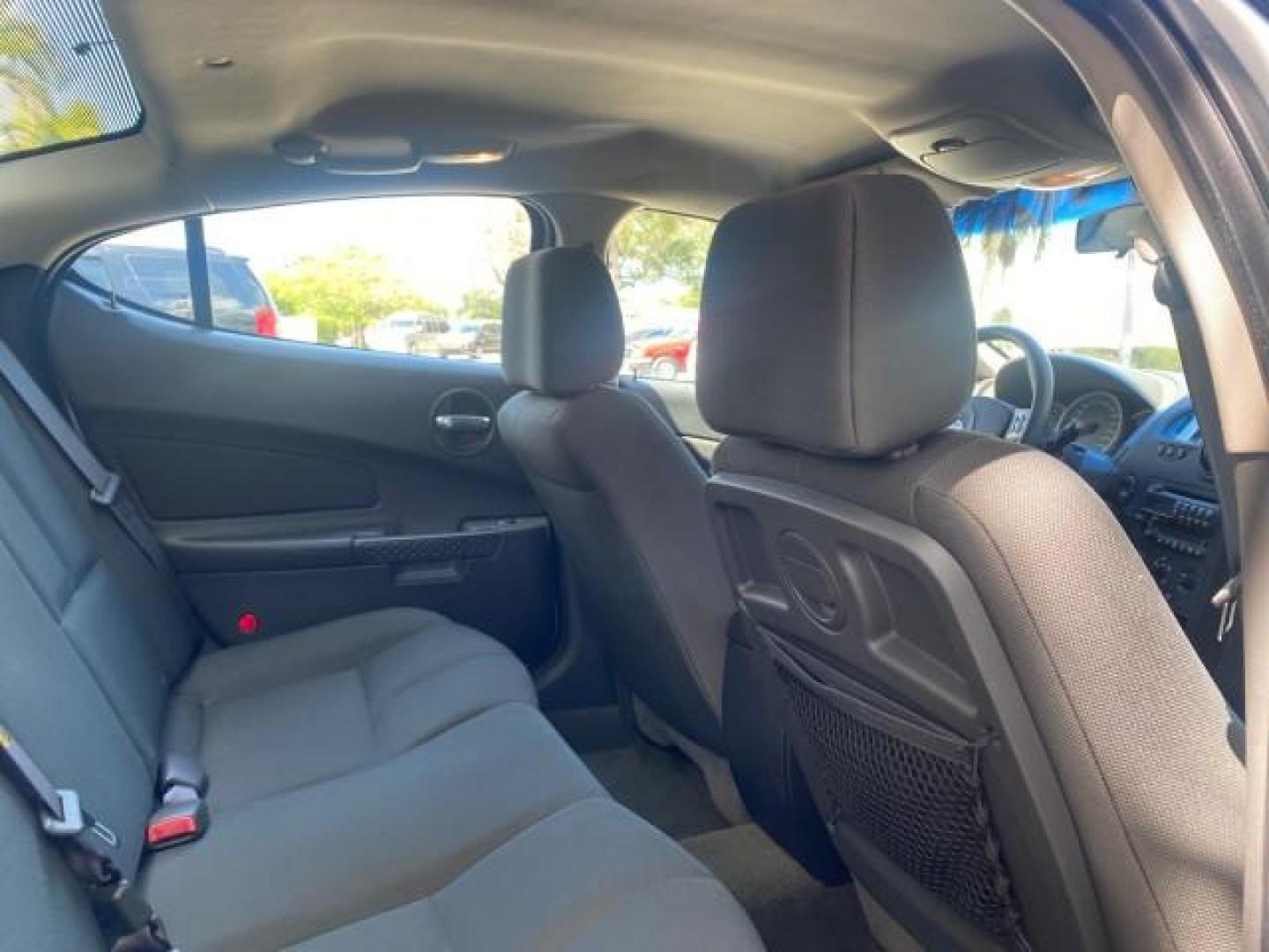 2004 Greystone Metallic /Dark Pewter Pontiac Grand Prix GT2 LOW MILES 76,788 1 OWNER FL (2G2WS522041) with an 3.8L 3800 Series Iii V6 SFI Engine engine, Automatic transmission, located at 4701 North Dixie Hwy, Pompano Beach, FL, 33064, (954) 422-2889, 26.240938, -80.123474 - OUR WEBPAGE FLORIDACARS1.COM HAS OVER 100 PHOTOS AND FREE CARFAX LINK 2004 PONTIAC GRAND PRIX GT2 VIN: 2G2WS522041302919 2 G 2 W S 5 2 2 0 4 1 3 0 2 9 1 9 SEDAN 4 DR 3.8L V6 F 30 MPG THE BEST GASOLINE FRONT WHEEL DRIVE Top Features Alloy Wheels Cloth Seats Basic Features ABS Brakes CD Audio Power Mi - Photo#85