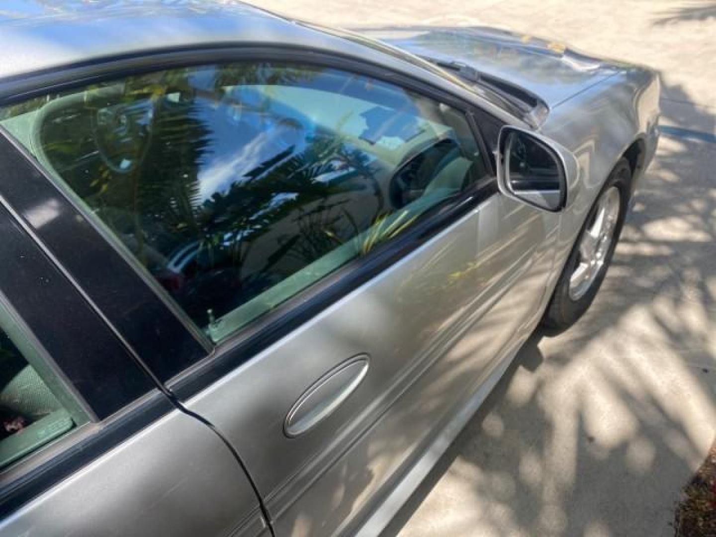 2004 Greystone Metallic /Dark Pewter Pontiac Grand Prix GT2 LOW MILES 76,788 1 OWNER FL (2G2WS522041) with an 3.8L 3800 Series Iii V6 SFI Engine engine, Automatic transmission, located at 4701 North Dixie Hwy, Pompano Beach, FL, 33064, (954) 422-2889, 26.240938, -80.123474 - OUR WEBPAGE FLORIDACARS1.COM HAS OVER 100 PHOTOS AND FREE CARFAX LINK 2004 PONTIAC GRAND PRIX GT2 VIN: 2G2WS522041302919 2 G 2 W S 5 2 2 0 4 1 3 0 2 9 1 9 SEDAN 4 DR 3.8L V6 F 30 MPG THE BEST GASOLINE FRONT WHEEL DRIVE Top Features Alloy Wheels Cloth Seats Basic Features ABS Brakes CD Audio Power Mi - Photo#88