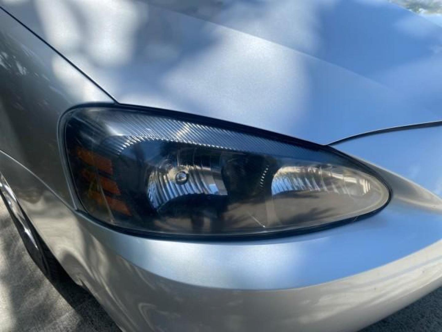 2004 Greystone Metallic /Dark Pewter Pontiac Grand Prix GT2 LOW MILES 76,788 1 OWNER FL (2G2WS522041) with an 3.8L 3800 Series Iii V6 SFI Engine engine, Automatic transmission, located at 4701 North Dixie Hwy, Pompano Beach, FL, 33064, (954) 422-2889, 26.240938, -80.123474 - OUR WEBPAGE FLORIDACARS1.COM HAS OVER 100 PHOTOS AND FREE CARFAX LINK 2004 PONTIAC GRAND PRIX GT2 VIN: 2G2WS522041302919 2 G 2 W S 5 2 2 0 4 1 3 0 2 9 1 9 SEDAN 4 DR 3.8L V6 F 30 MPG THE BEST GASOLINE FRONT WHEEL DRIVE Top Features Alloy Wheels Cloth Seats Basic Features ABS Brakes CD Audio Power Mi - Photo#99