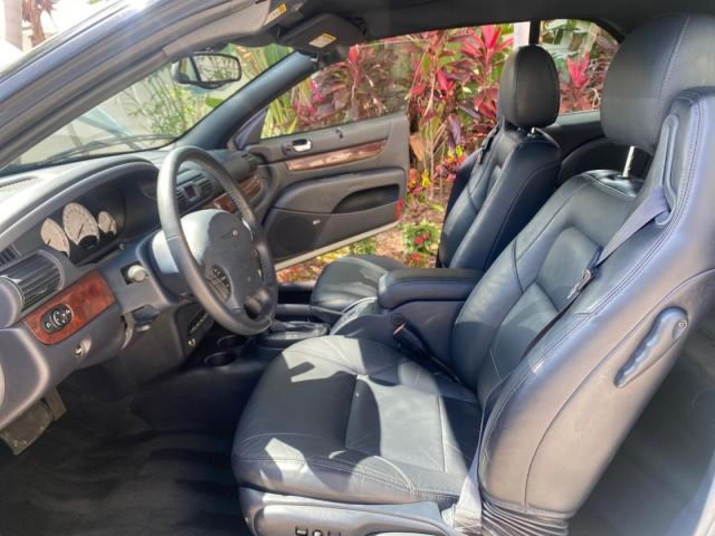 2002 Steel Blue Pearl /Deep Royal Blue Chrysler Sebring Limited 1 OWNER FL LOW MILES 37,932 (1C3EL65RX2N) with an 2.7L MFI DOHC 24-Valve V6 Engine engine, Automatic transmission, located at 4701 North Dixie Hwy, Pompano Beach, FL, 33064, (954) 422-2889, 26.240938, -80.123474 - OUR WEBPAGE FLORIDACARS1.COM HAS OVER 100 PHOTOS AND FREE CARFAX LINK 2002 CHRYSLER SEBRING LIMITED VIN: 1C3EL65RX2N127842 1 C 3 E L 6 5 R X 2 N 1 2 7 8 4 2 CONVERTIBLE 2.7L V6 F DOHC GASOLINE FRONT WHEEL DRIVE Top Features Alloy Wheels Soft Top Infinity Sound System Sunroof(s) Leather Seats Basic F - Photo#10