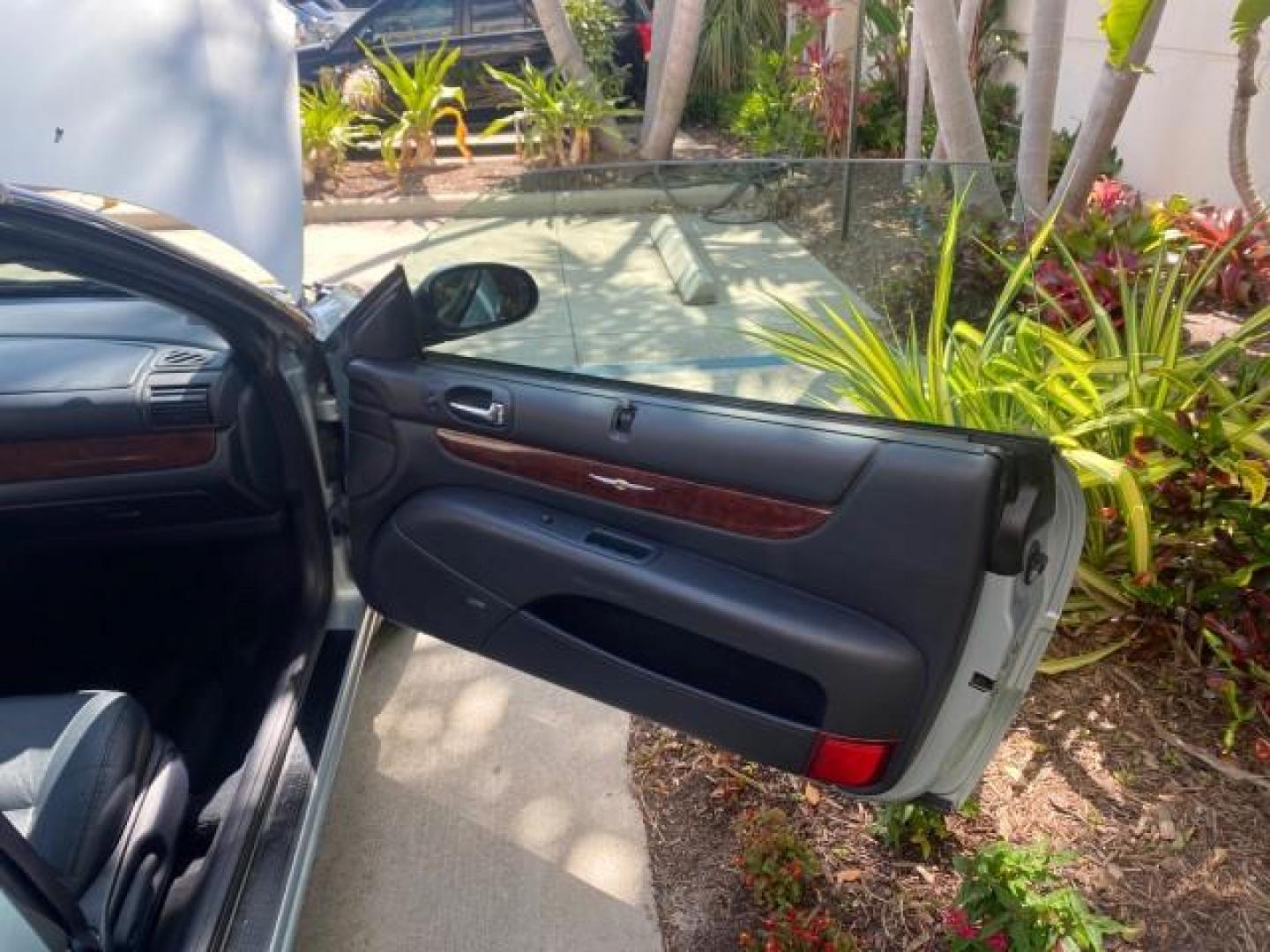 2002 Steel Blue Pearl /Deep Royal Blue Chrysler Sebring Limited 1 OWNER FL LOW MILES 37,932 (1C3EL65RX2N) with an 2.7L MFI DOHC 24-Valve V6 Engine engine, Automatic transmission, located at 4701 North Dixie Hwy, Pompano Beach, FL, 33064, (954) 422-2889, 26.240938, -80.123474 - OUR WEBPAGE FLORIDACARS1.COM HAS OVER 100 PHOTOS AND FREE CARFAX LINK 2002 CHRYSLER SEBRING LIMITED VIN: 1C3EL65RX2N127842 1 C 3 E L 6 5 R X 2 N 1 2 7 8 4 2 CONVERTIBLE 2.7L V6 F DOHC GASOLINE FRONT WHEEL DRIVE Top Features Alloy Wheels Soft Top Infinity Sound System Sunroof(s) Leather Seats Basic F - Photo#11