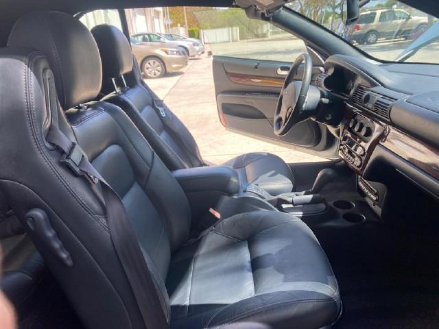 2002 Steel Blue Pearl /Deep Royal Blue Chrysler Sebring Limited 1 OWNER FL LOW MILES 37,932 (1C3EL65RX2N) with an 2.7L MFI DOHC 24-Valve V6 Engine engine, Automatic transmission, located at 4701 North Dixie Hwy, Pompano Beach, FL, 33064, (954) 422-2889, 26.240938, -80.123474 - OUR WEBPAGE FLORIDACARS1.COM HAS OVER 100 PHOTOS AND FREE CARFAX LINK 2002 CHRYSLER SEBRING LIMITED VIN: 1C3EL65RX2N127842 1 C 3 E L 6 5 R X 2 N 1 2 7 8 4 2 CONVERTIBLE 2.7L V6 F DOHC GASOLINE FRONT WHEEL DRIVE Top Features Alloy Wheels Soft Top Infinity Sound System Sunroof(s) Leather Seats Basic F - Photo#12