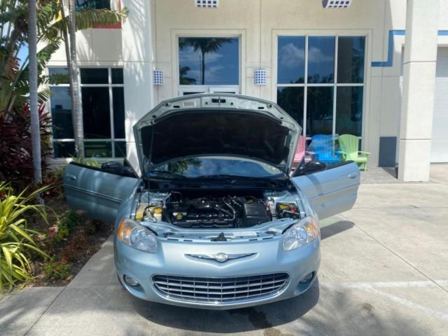 2002 Steel Blue Pearl /Deep Royal Blue Chrysler Sebring Limited 1 OWNER FL LOW MILES 37,932 (1C3EL65RX2N) with an 2.7L MFI DOHC 24-Valve V6 Engine engine, Automatic transmission, located at 4701 North Dixie Hwy, Pompano Beach, FL, 33064, (954) 422-2889, 26.240938, -80.123474 - OUR WEBPAGE FLORIDACARS1.COM HAS OVER 100 PHOTOS AND FREE CARFAX LINK 2002 CHRYSLER SEBRING LIMITED VIN: 1C3EL65RX2N127842 1 C 3 E L 6 5 R X 2 N 1 2 7 8 4 2 CONVERTIBLE 2.7L V6 F DOHC GASOLINE FRONT WHEEL DRIVE Top Features Alloy Wheels Soft Top Infinity Sound System Sunroof(s) Leather Seats Basic F - Photo#16
