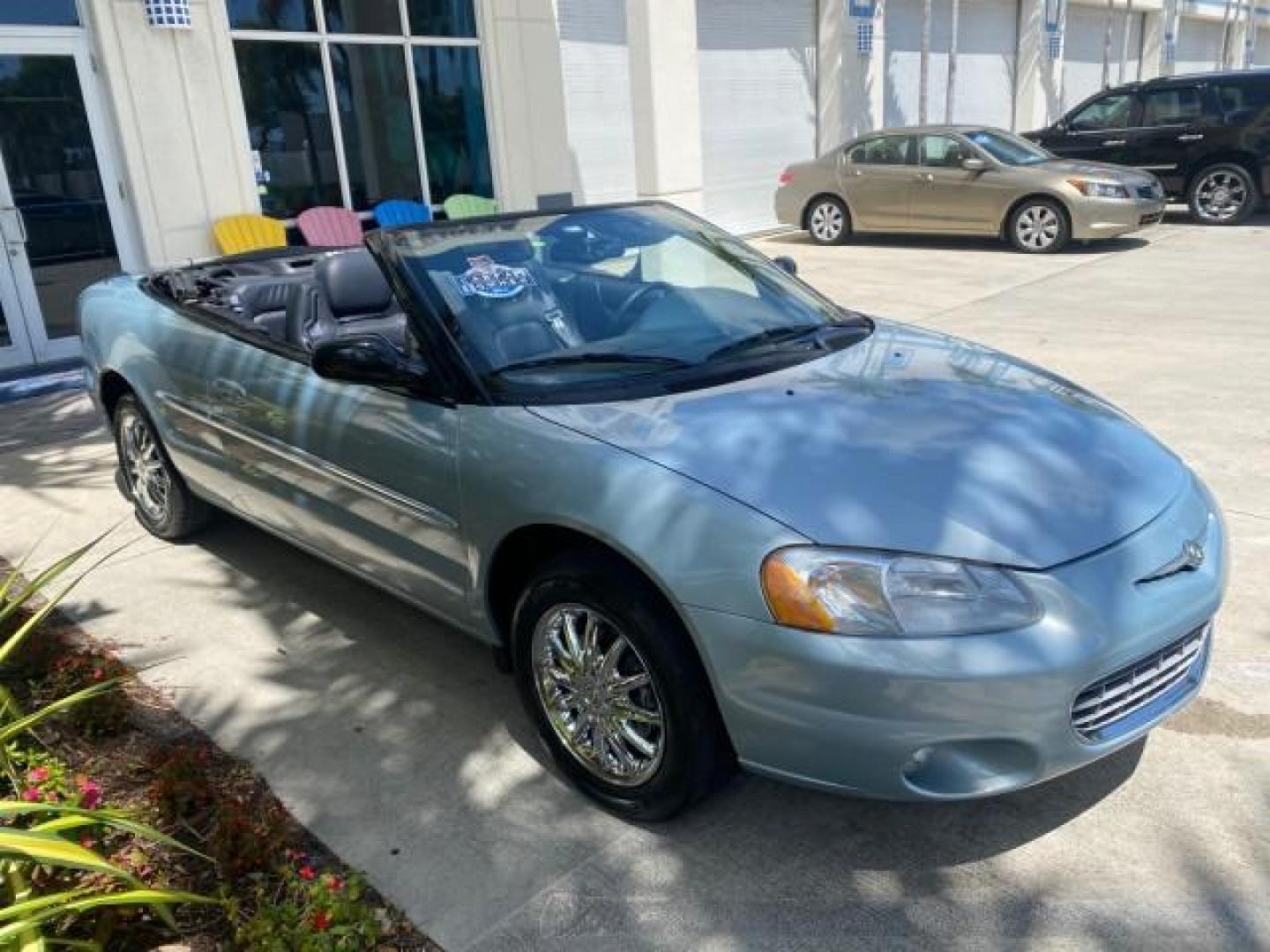 2002 Steel Blue Pearl /Deep Royal Blue Chrysler Sebring Limited 1 OWNER FL LOW MILES 37,932 (1C3EL65RX2N) with an 2.7L MFI DOHC 24-Valve V6 Engine engine, Automatic transmission, located at 4701 North Dixie Hwy, Pompano Beach, FL, 33064, (954) 422-2889, 26.240938, -80.123474 - OUR WEBPAGE FLORIDACARS1.COM HAS OVER 100 PHOTOS AND FREE CARFAX LINK 2002 CHRYSLER SEBRING LIMITED VIN: 1C3EL65RX2N127842 1 C 3 E L 6 5 R X 2 N 1 2 7 8 4 2 CONVERTIBLE 2.7L V6 F DOHC GASOLINE FRONT WHEEL DRIVE Top Features Alloy Wheels Soft Top Infinity Sound System Sunroof(s) Leather Seats Basic F - Photo#24
