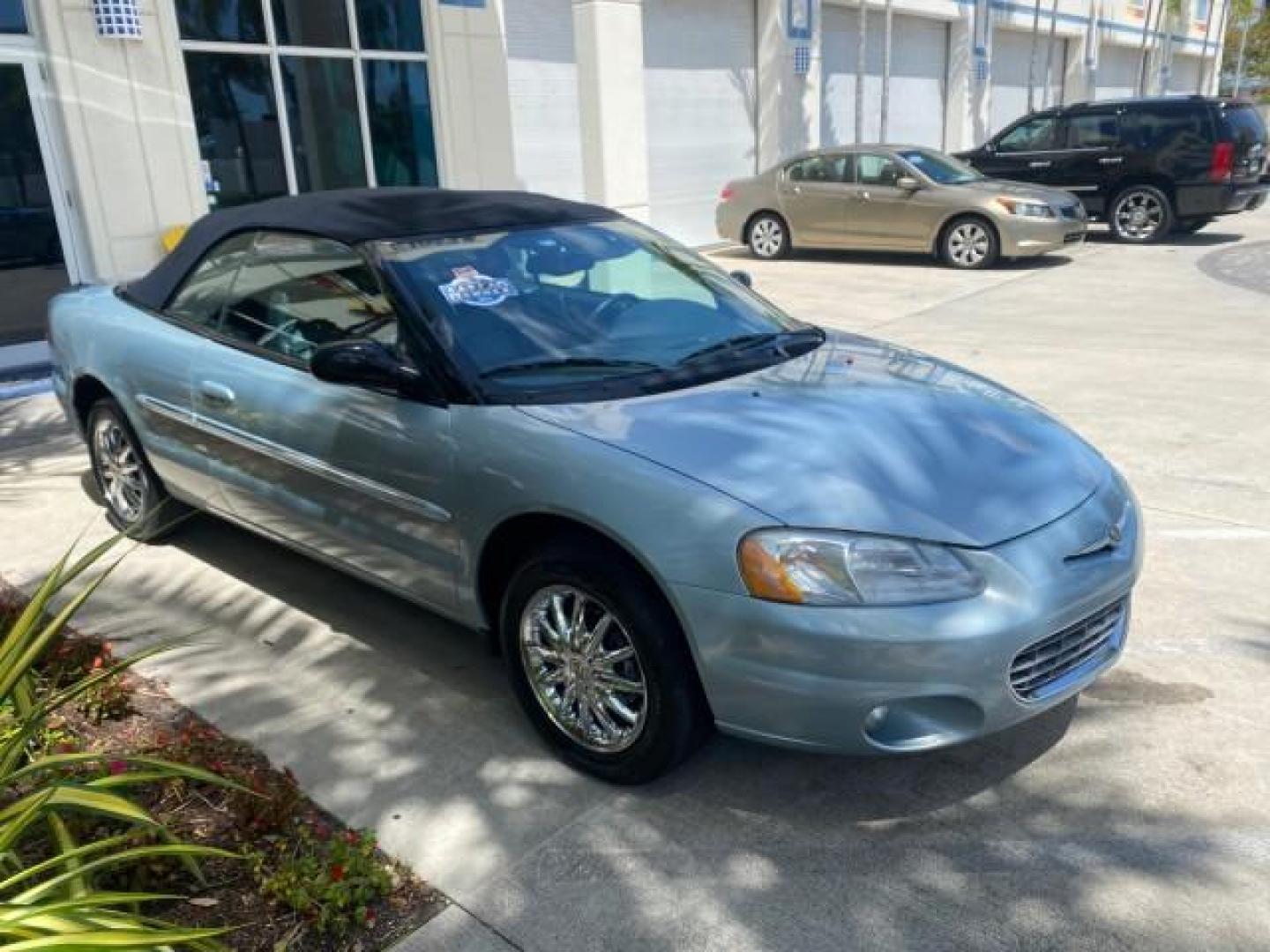 2002 Steel Blue Pearl /Deep Royal Blue Chrysler Sebring Limited 1 OWNER FL LOW MILES 37,932 (1C3EL65RX2N) with an 2.7L MFI DOHC 24-Valve V6 Engine engine, Automatic transmission, located at 4701 North Dixie Hwy, Pompano Beach, FL, 33064, (954) 422-2889, 26.240938, -80.123474 - OUR WEBPAGE FLORIDACARS1.COM HAS OVER 100 PHOTOS AND FREE CARFAX LINK 2002 CHRYSLER SEBRING LIMITED VIN: 1C3EL65RX2N127842 1 C 3 E L 6 5 R X 2 N 1 2 7 8 4 2 CONVERTIBLE 2.7L V6 F DOHC GASOLINE FRONT WHEEL DRIVE Top Features Alloy Wheels Soft Top Infinity Sound System Sunroof(s) Leather Seats Basic F - Photo#25