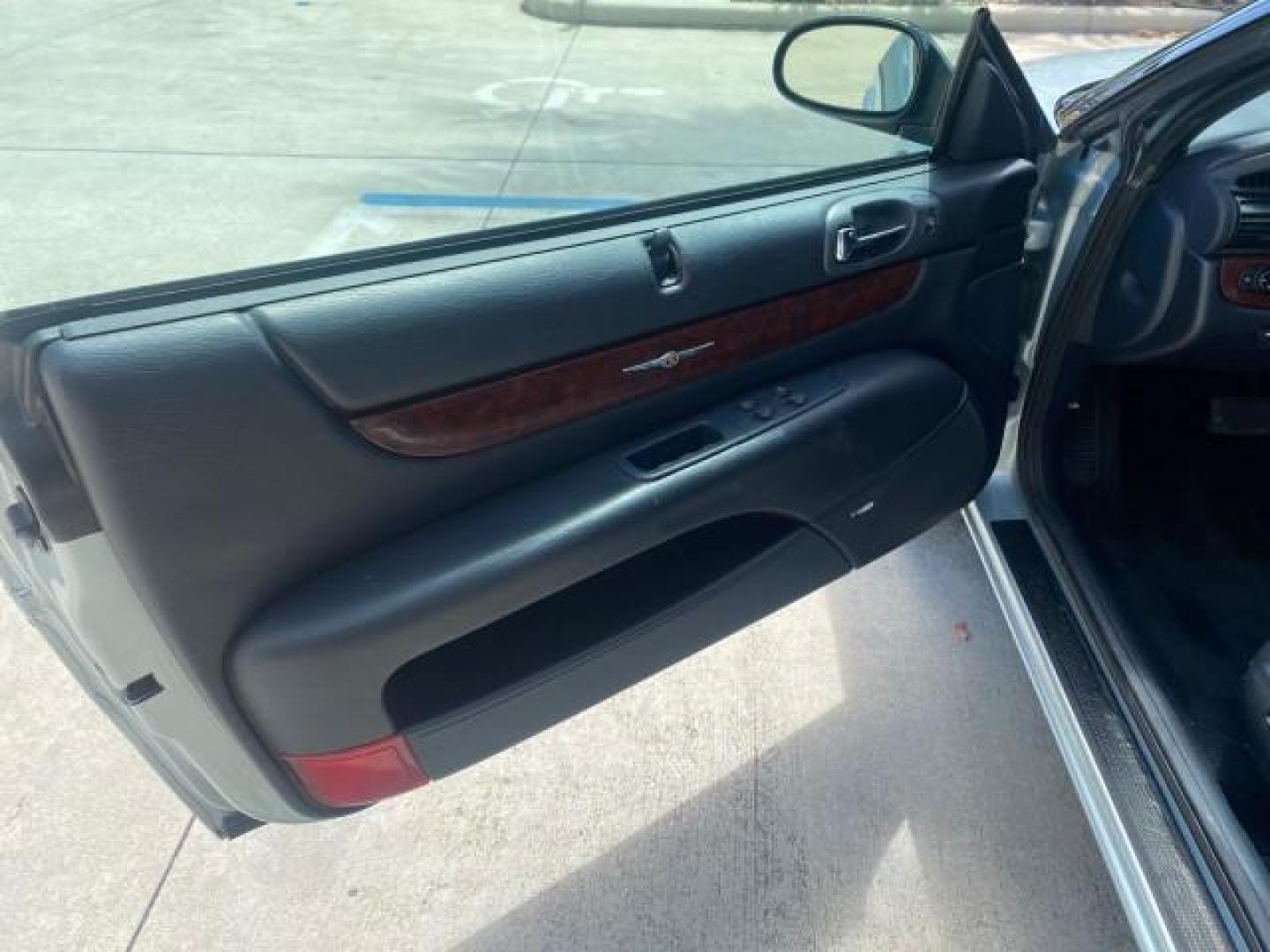 2002 Steel Blue Pearl /Deep Royal Blue Chrysler Sebring Limited 1 OWNER FL LOW MILES 37,932 (1C3EL65RX2N) with an 2.7L MFI DOHC 24-Valve V6 Engine engine, Automatic transmission, located at 4701 North Dixie Hwy, Pompano Beach, FL, 33064, (954) 422-2889, 26.240938, -80.123474 - OUR WEBPAGE FLORIDACARS1.COM HAS OVER 100 PHOTOS AND FREE CARFAX LINK 2002 CHRYSLER SEBRING LIMITED VIN: 1C3EL65RX2N127842 1 C 3 E L 6 5 R X 2 N 1 2 7 8 4 2 CONVERTIBLE 2.7L V6 F DOHC GASOLINE FRONT WHEEL DRIVE Top Features Alloy Wheels Soft Top Infinity Sound System Sunroof(s) Leather Seats Basic F - Photo#32