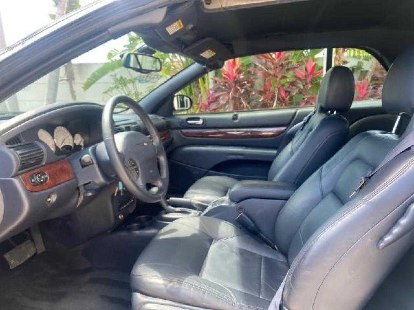 2002 Steel Blue Pearl /Deep Royal Blue Chrysler Sebring Limited 1 OWNER FL LOW MILES 37,932 (1C3EL65RX2N) with an 2.7L MFI DOHC 24-Valve V6 Engine engine, Automatic transmission, located at 4701 North Dixie Hwy, Pompano Beach, FL, 33064, (954) 422-2889, 26.240938, -80.123474 - OUR WEBPAGE FLORIDACARS1.COM HAS OVER 100 PHOTOS AND FREE CARFAX LINK 2002 CHRYSLER SEBRING LIMITED VIN: 1C3EL65RX2N127842 1 C 3 E L 6 5 R X 2 N 1 2 7 8 4 2 CONVERTIBLE 2.7L V6 F DOHC GASOLINE FRONT WHEEL DRIVE Top Features Alloy Wheels Soft Top Infinity Sound System Sunroof(s) Leather Seats Basic F - Photo#33