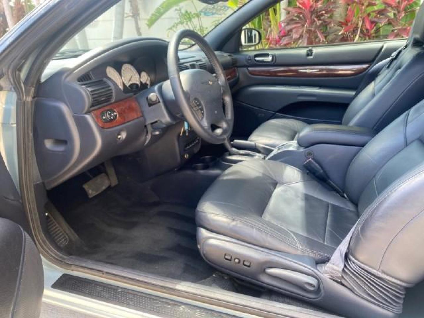 2002 Steel Blue Pearl /Deep Royal Blue Chrysler Sebring Limited 1 OWNER FL LOW MILES 37,932 (1C3EL65RX2N) with an 2.7L MFI DOHC 24-Valve V6 Engine engine, Automatic transmission, located at 4701 North Dixie Hwy, Pompano Beach, FL, 33064, (954) 422-2889, 26.240938, -80.123474 - OUR WEBPAGE FLORIDACARS1.COM HAS OVER 100 PHOTOS AND FREE CARFAX LINK 2002 CHRYSLER SEBRING LIMITED VIN: 1C3EL65RX2N127842 1 C 3 E L 6 5 R X 2 N 1 2 7 8 4 2 CONVERTIBLE 2.7L V6 F DOHC GASOLINE FRONT WHEEL DRIVE Top Features Alloy Wheels Soft Top Infinity Sound System Sunroof(s) Leather Seats Basic F - Photo#34